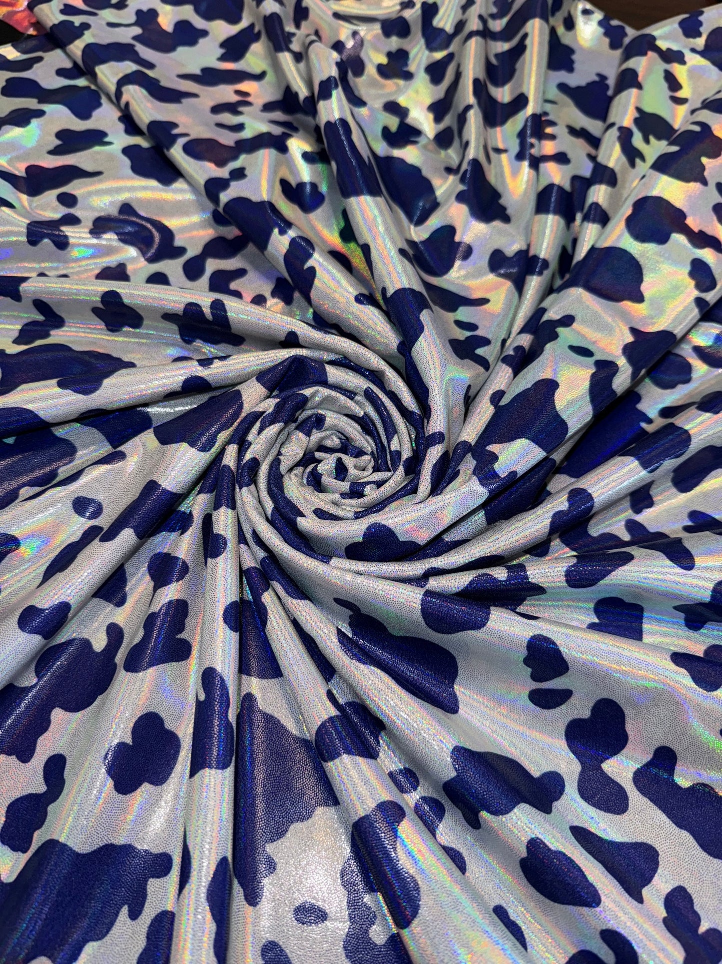 New luxury cow pattern design print on nylon spandex metallic hologram4-way stretch 58/60”sold by the YD.Ships worldwide from Los Angeles CA