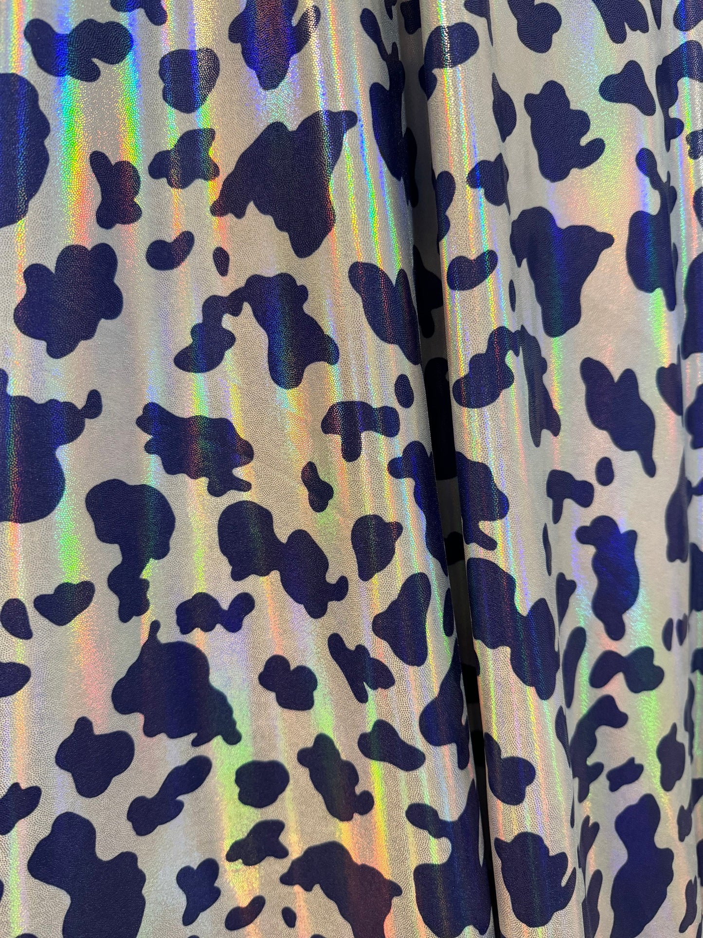 New luxury cow pattern design print on nylon spandex metallic hologram4-way stretch 58/60”sold by the YD.Ships worldwide from Los Angeles CA