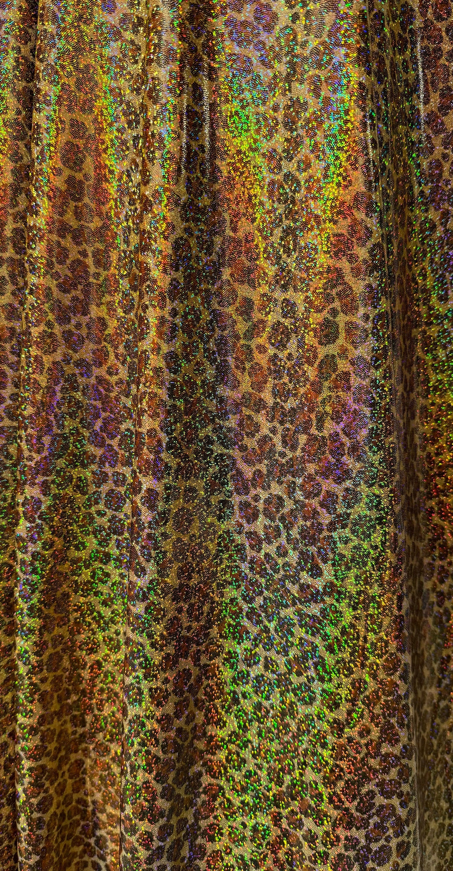 New Cheetah leopard print on hologram metallic nylon spandex 4way stretch 58/60”sold by the YD.Ships worldwide from Los Angeles California.