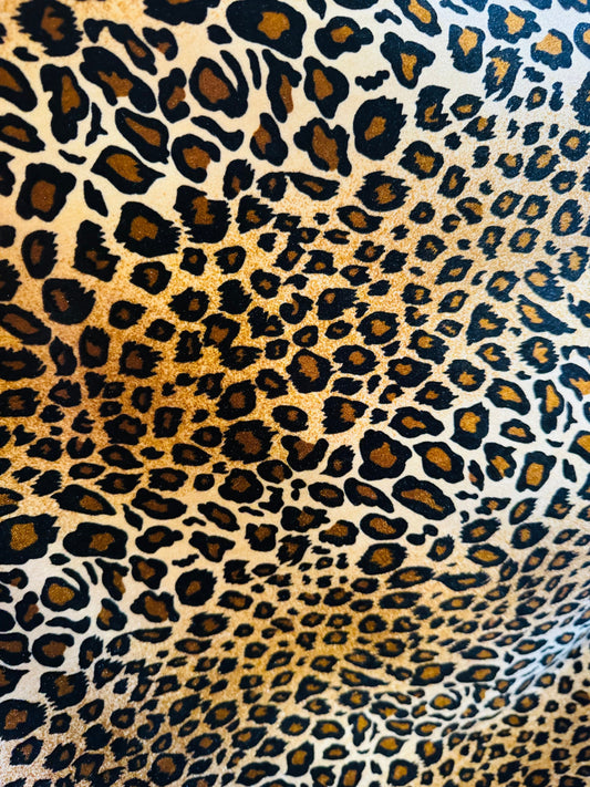 luxury Leopard design print on stretch velvet poly spandex 4way stretch 58/60”sold by the YD.Ships worldwide from Los Angele California USA.