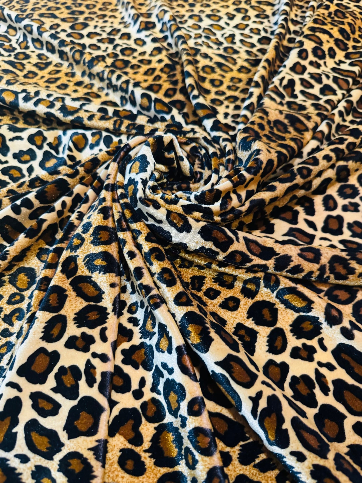 luxury Leopard design print on stretch velvet poly spandex 4way stretch 58/60”sold by the YD.Ships worldwide from Los Angele California USA.