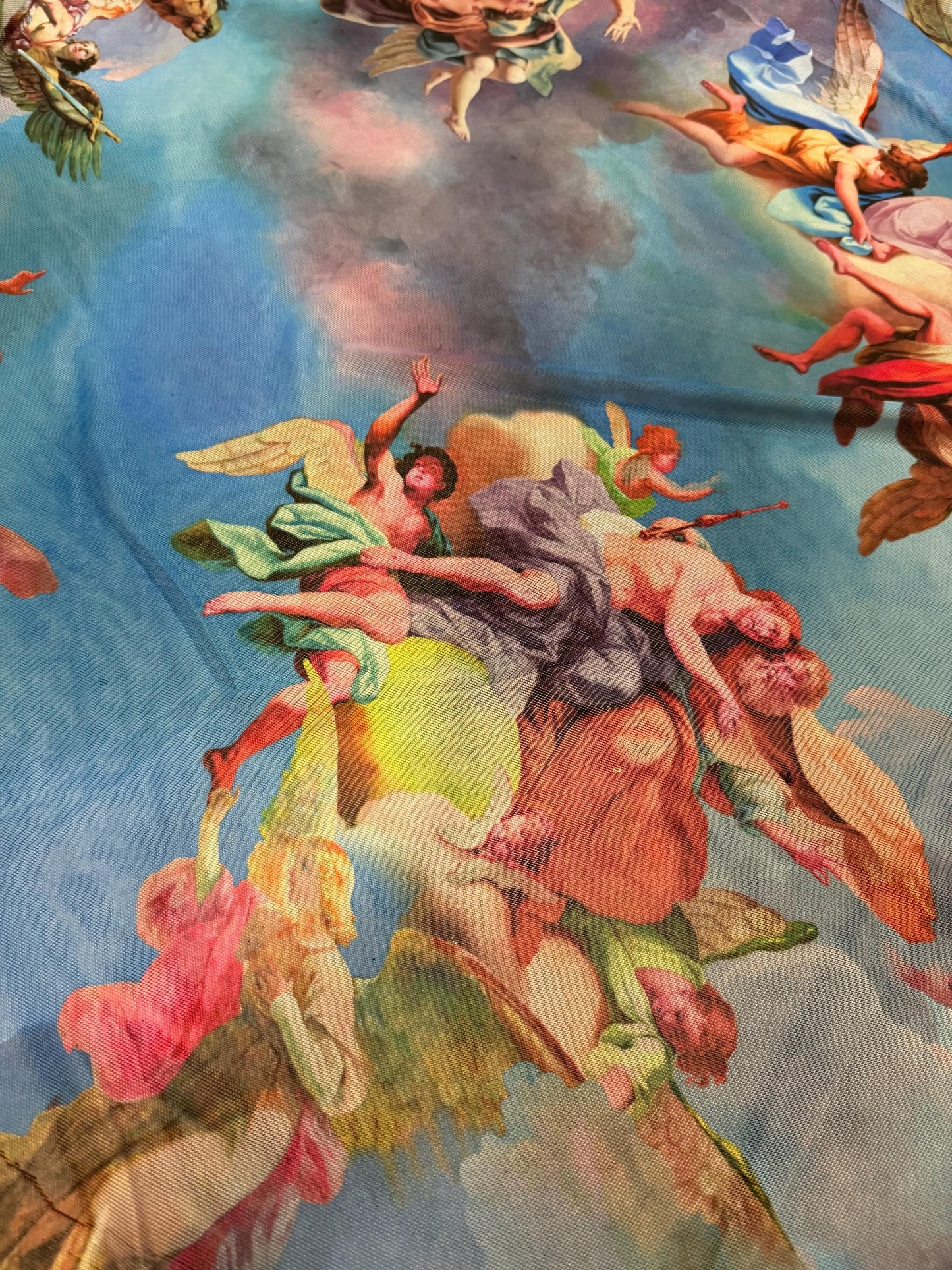 New angels and clouds design print on power mesh nylon spandex4-stretch 58/60”sold by the YD.Ships worldwide from Los Angeles California.