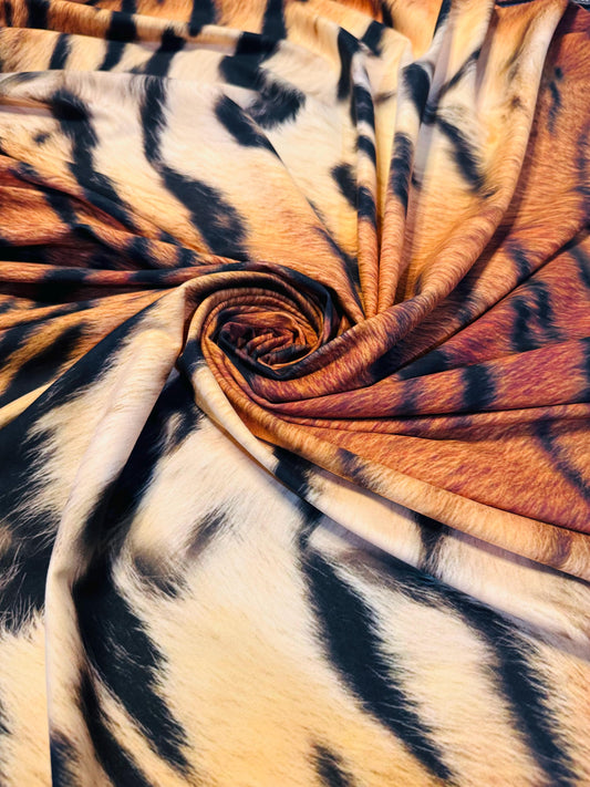 New  Exotic tiger design print on the best quality of nylon spandex 4way stretch 58/60” Sold by the YD.Ships worldwide from LA