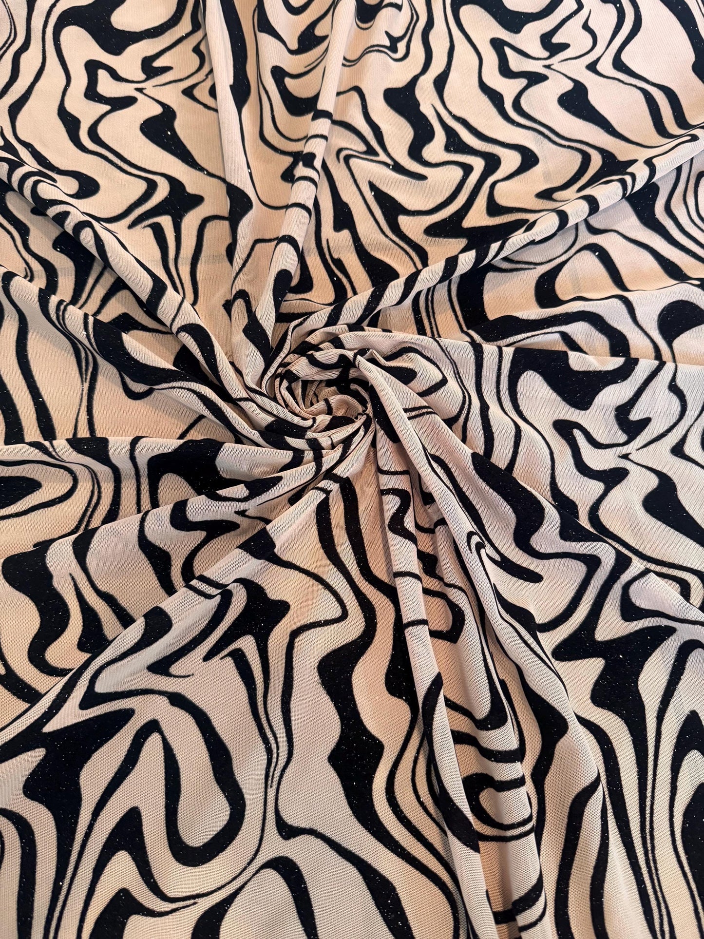 Modern abstract mesh with floking design nylon spandex 4-way stretch 58/60” sold by the YD.ships worldwide from Los Ángeles CA.