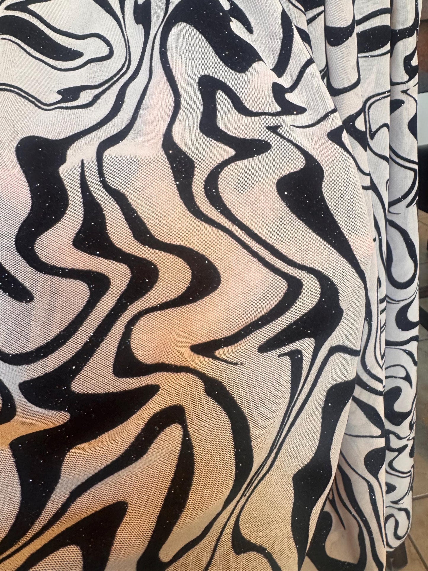 Modern abstract mesh with floking design nylon spandex 4-way stretch 58/60” sold by the YD.ships worldwide from Los Ángeles CA.