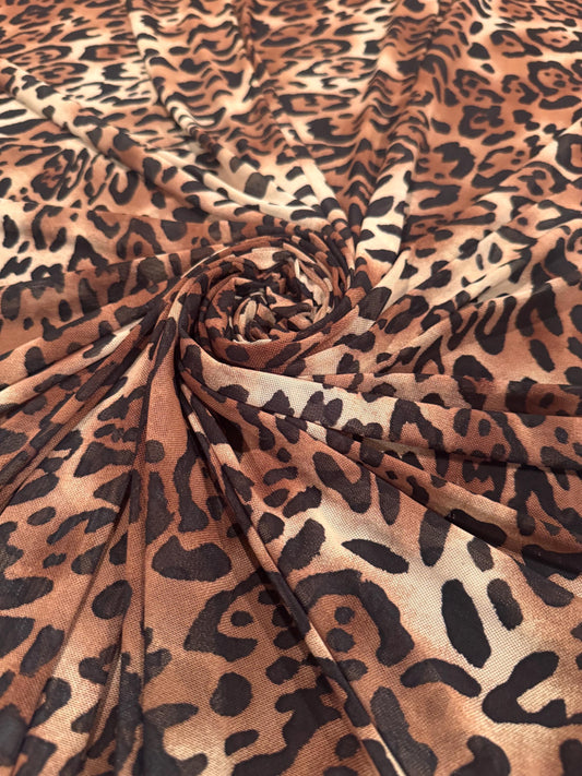 New Exotic Jaguar design print on power mesh 4-way stretch 58/60”sold by the YD. ships Worldwide from Los Angeles California USA