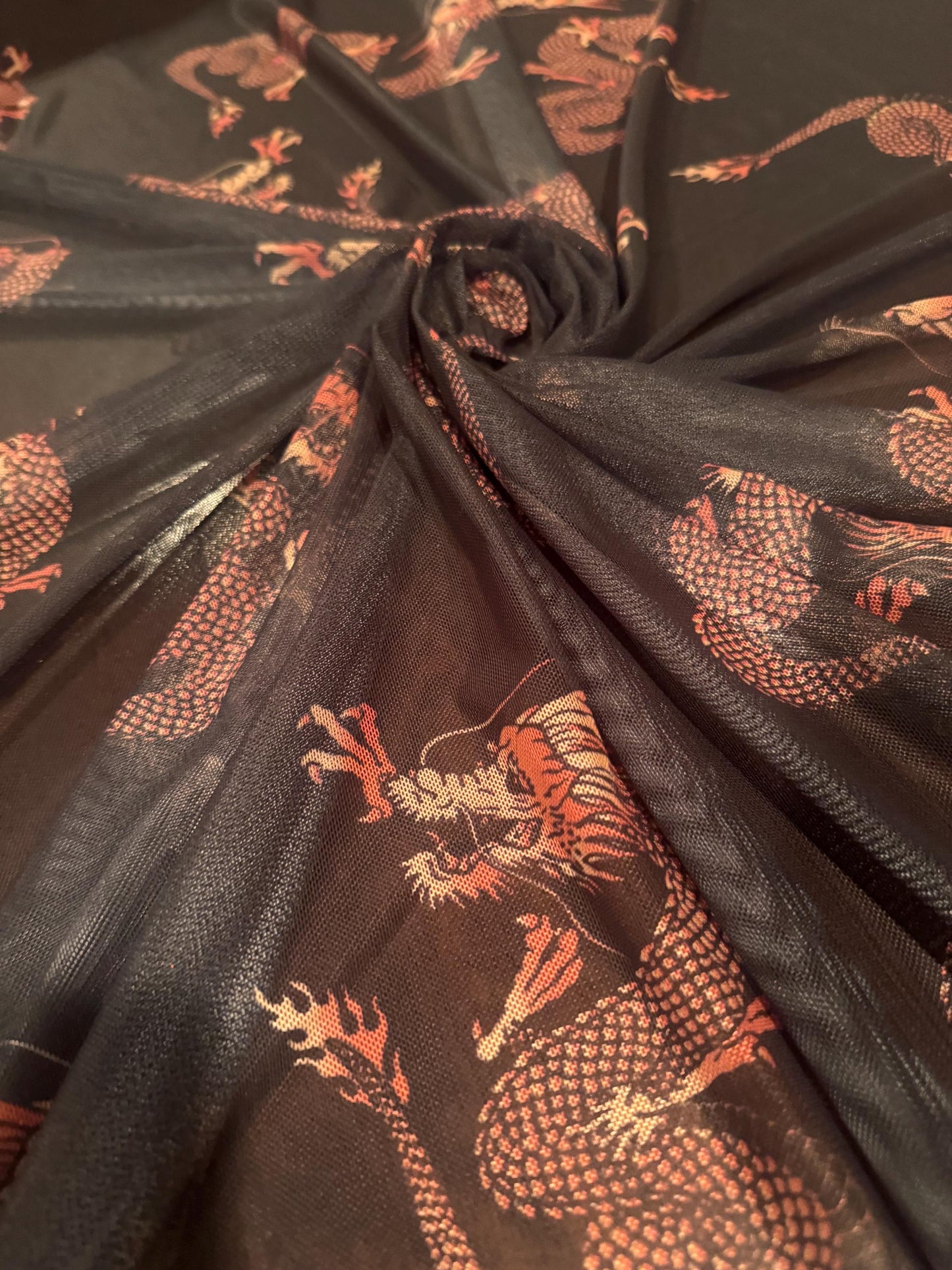 Magical dragon design print on  nylon spandex 4-way stretch 58/60”sold by the YD. ships worldwide from Los Angeles California