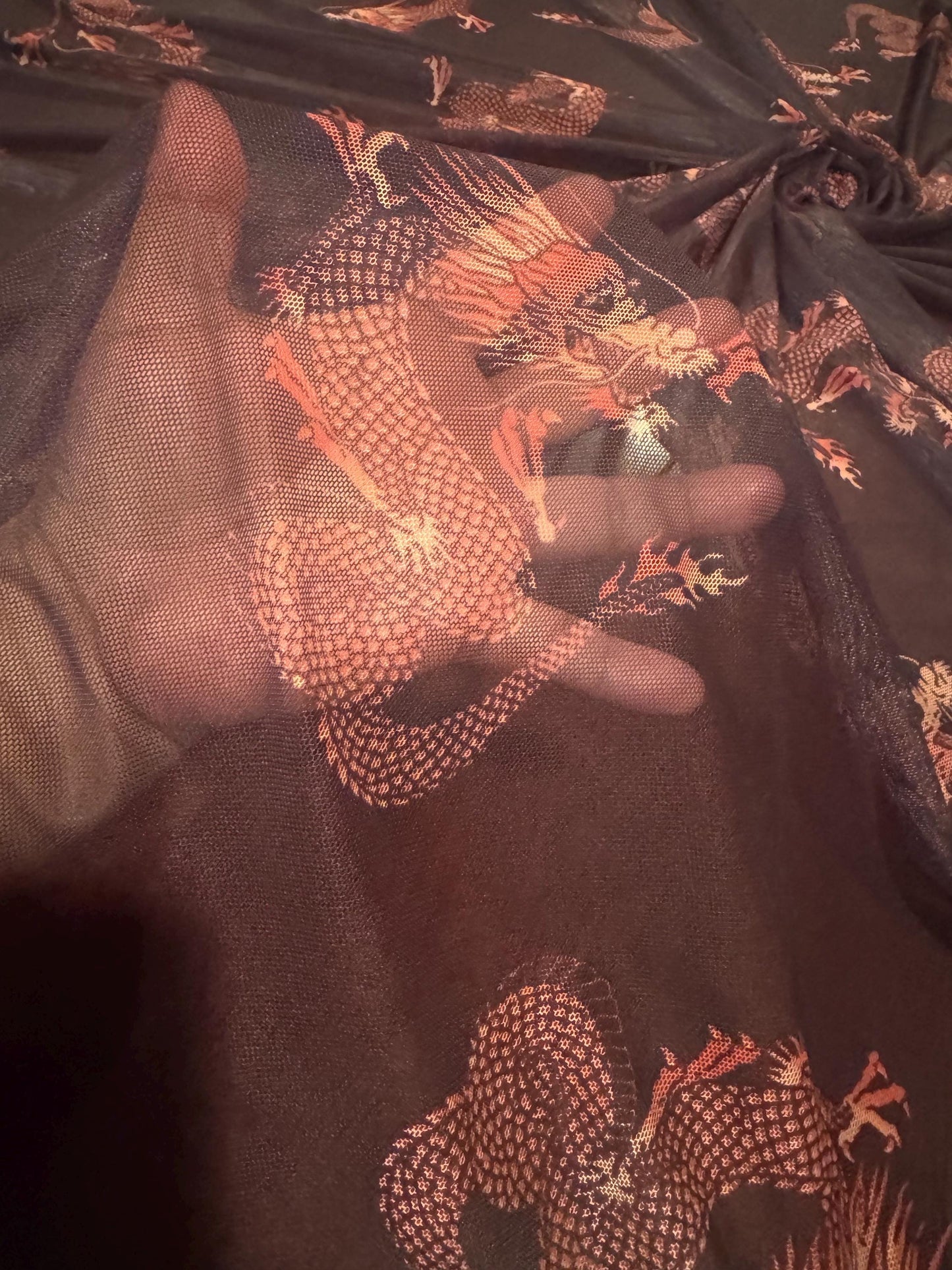 Magical dragon design print on  nylon spandex 4-way stretch 58/60”sold by the YD. ships worldwide from Los Angeles California