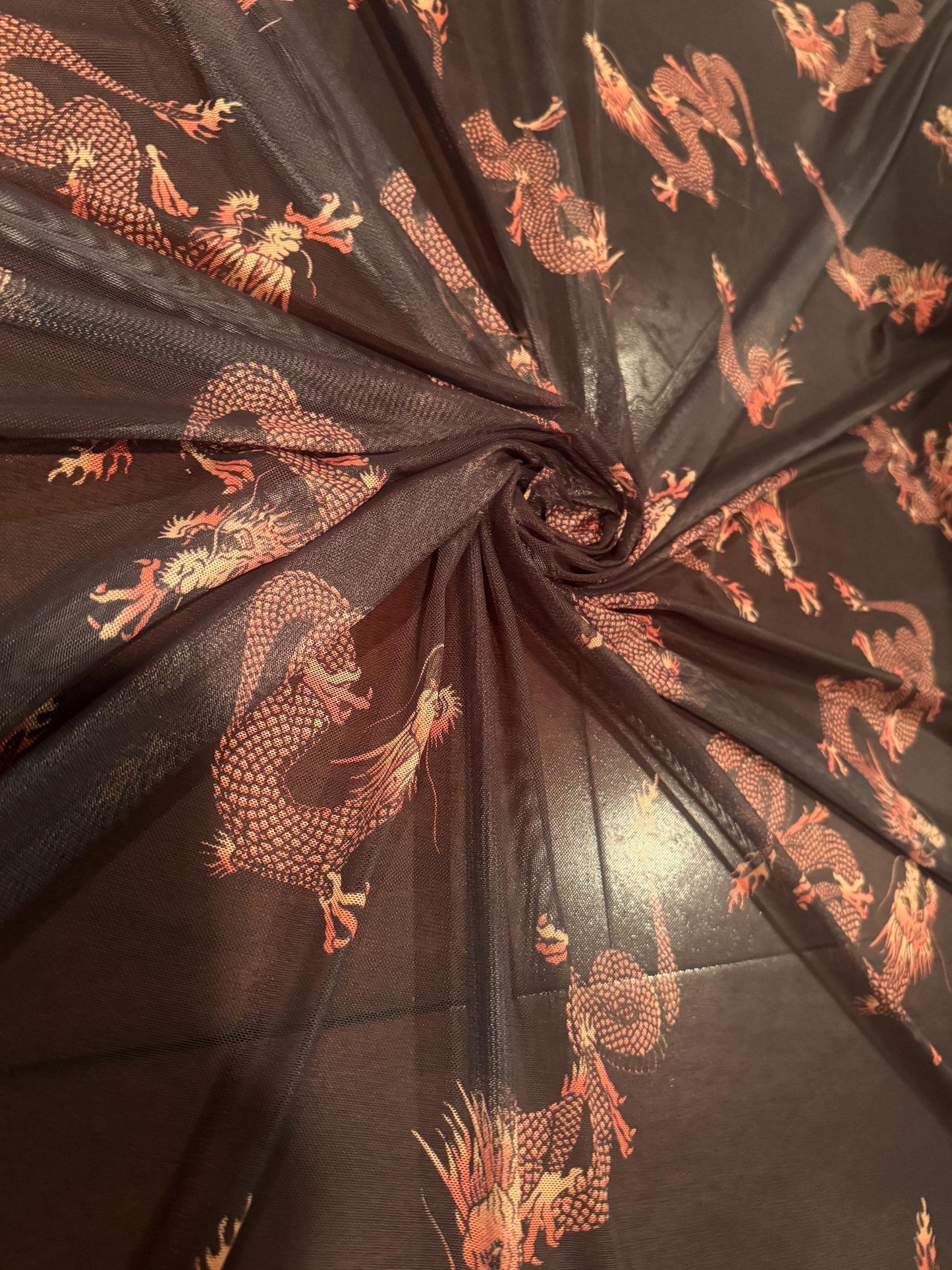 Magical dragon design print on  nylon spandex 4-way stretch 58/60”sold by the YD. ships worldwide from Los Angeles California