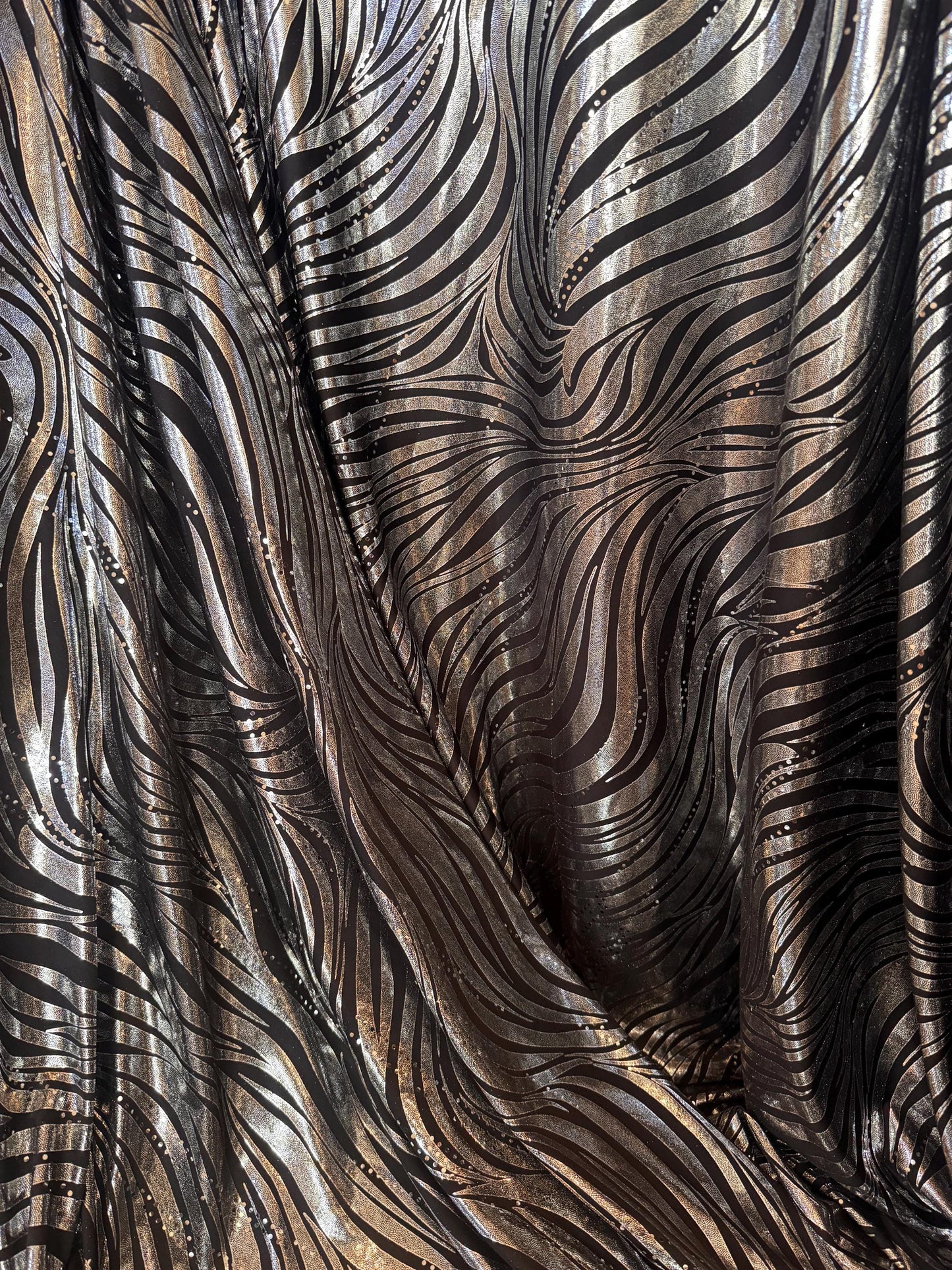 New Metallic zebra design design print on poly spandex 2-way stretch 58/60”sold by the YD.Ships worldwide from Los Angeles CA