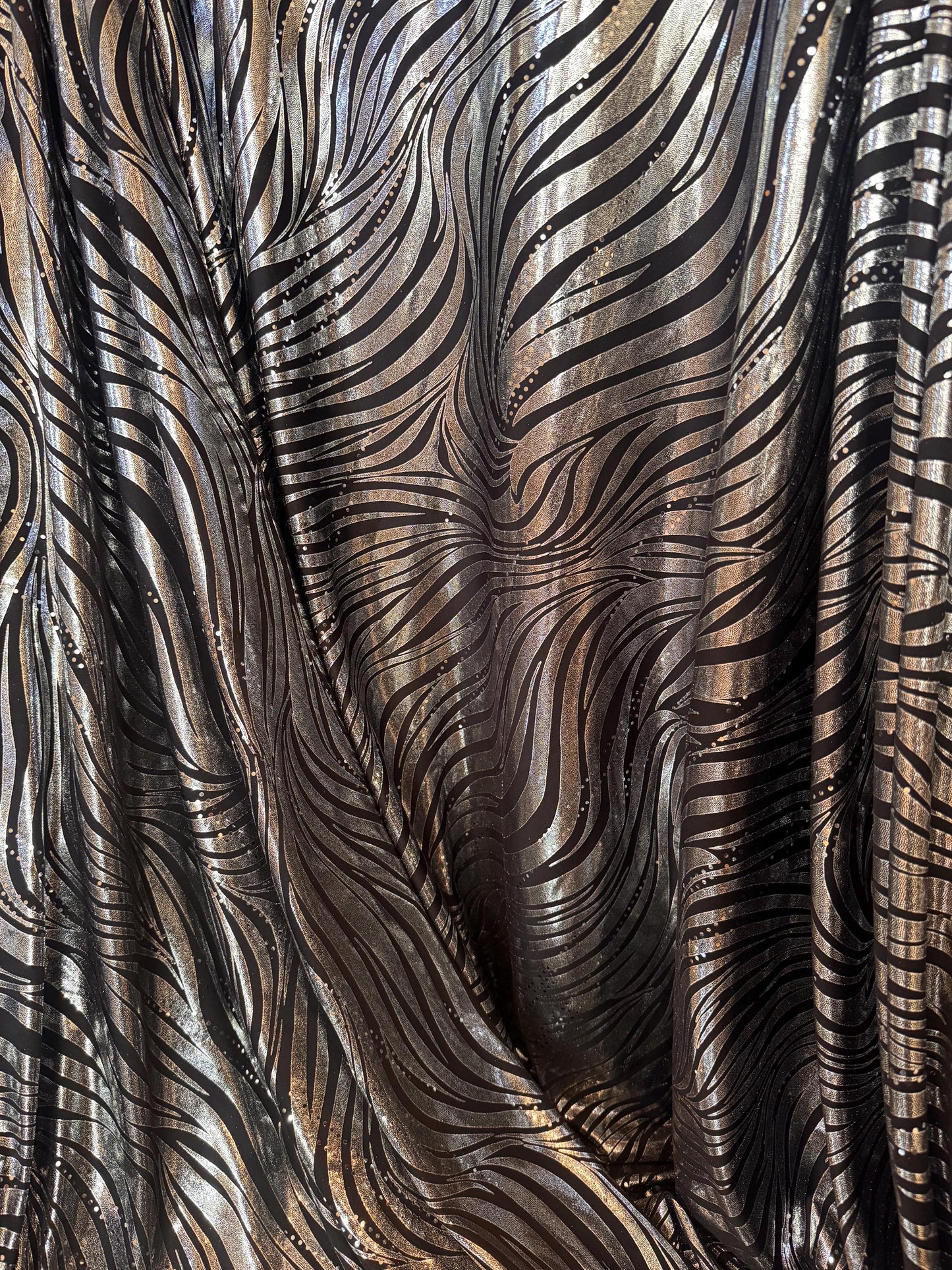 New Metallic zebra design design print on poly spandex 2-way stretch 58/60”sold by the YD.Ships worldwide from Los Angeles CA