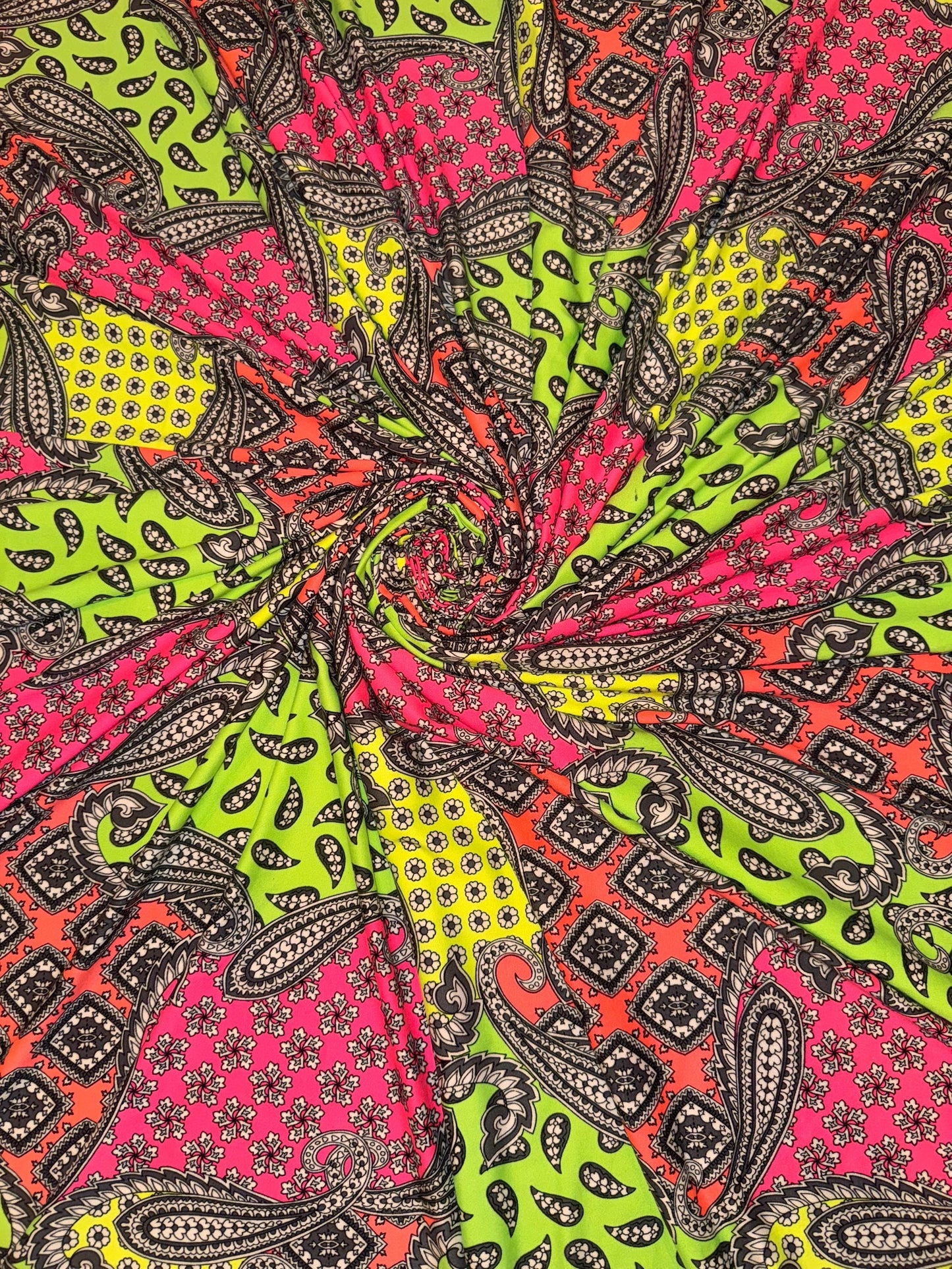 New Bandana neon color UV light  design print on the best quality of poly  spandex 4-way stretch 58/60”sold by the YD. Ships worldwide LA