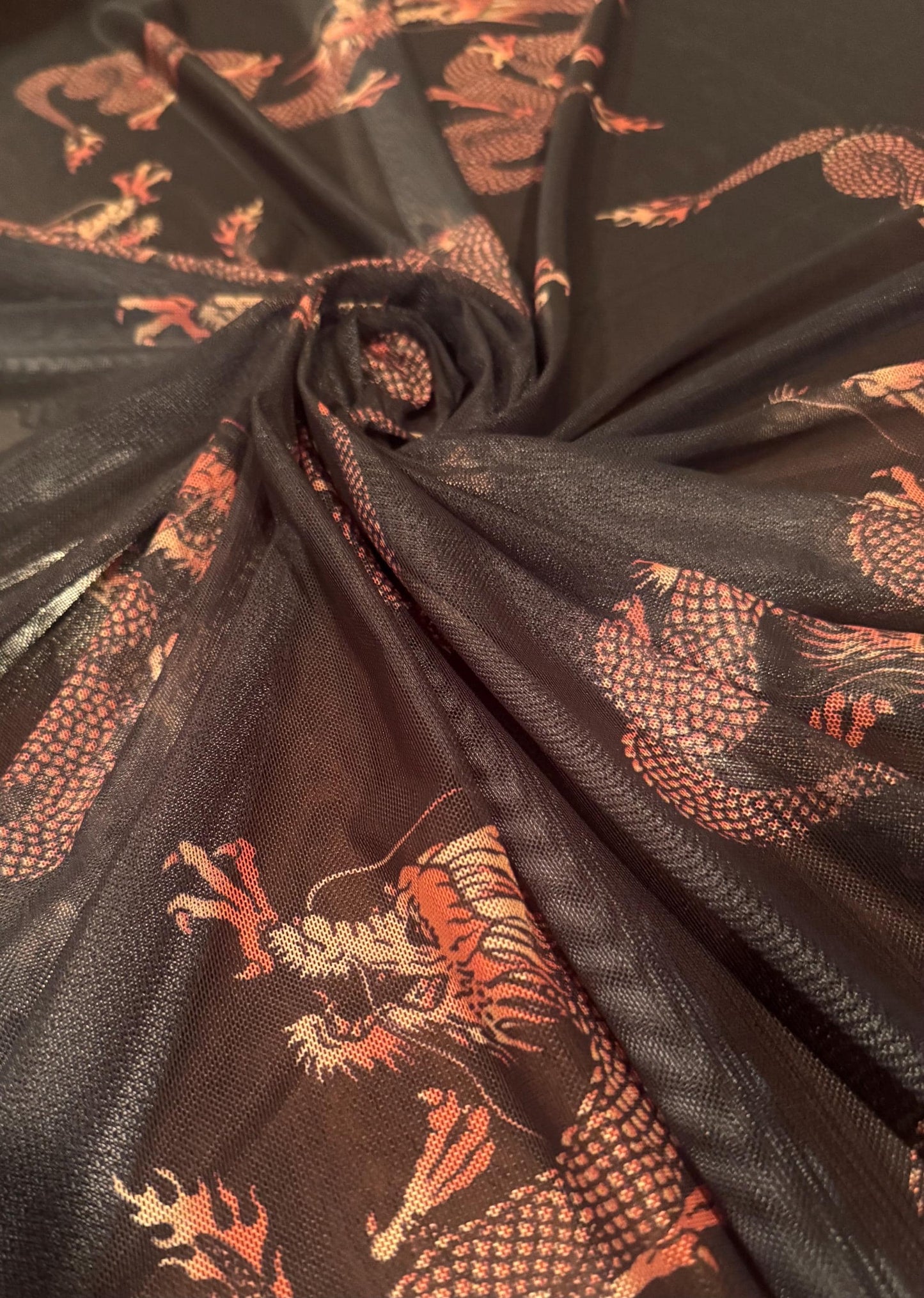 Magical dragon design print on  nylon spandex 4-way stretch 58/60”sold by the YD. ships worldwide from Los Angeles California