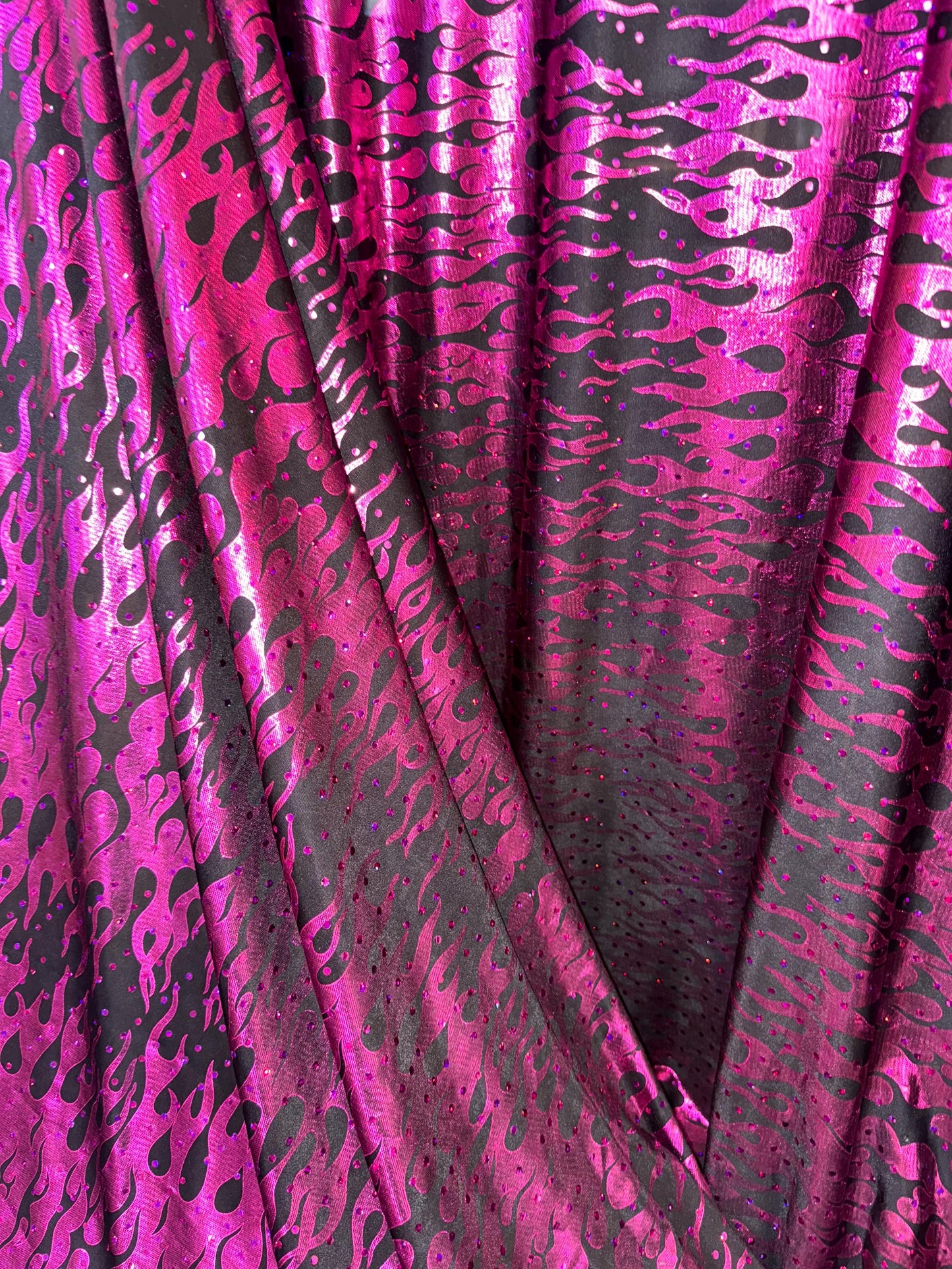 New Flames hologram metallic design print on poly spandex 2-way stretch 58/60”sold by the YD.Ships worldwide from Los Angeles CA