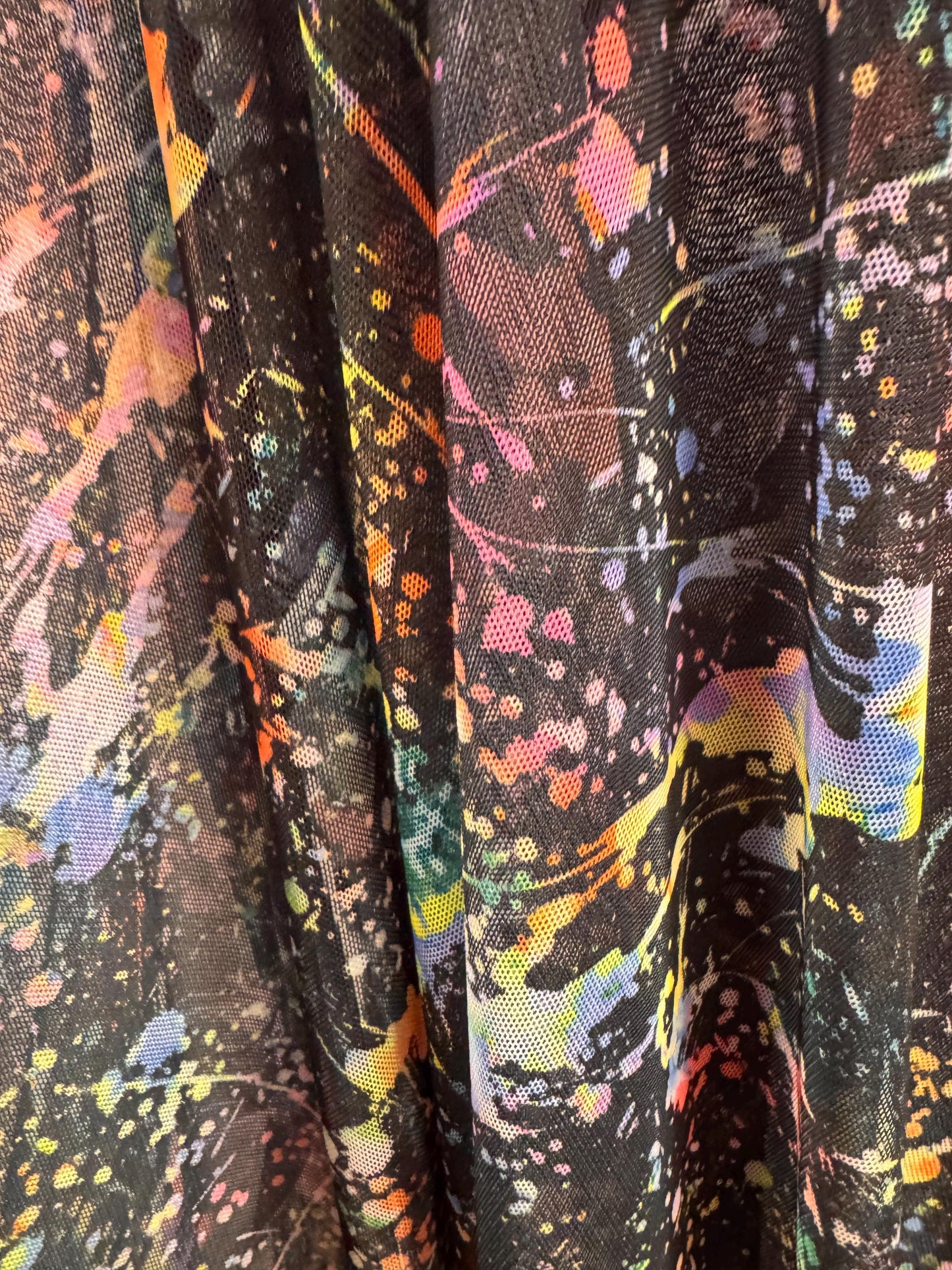 New colorful paint splatter design print on power mesh 4-way stretch 58/60” sold by the YD.ships worldwide from Los Ángeles California USA