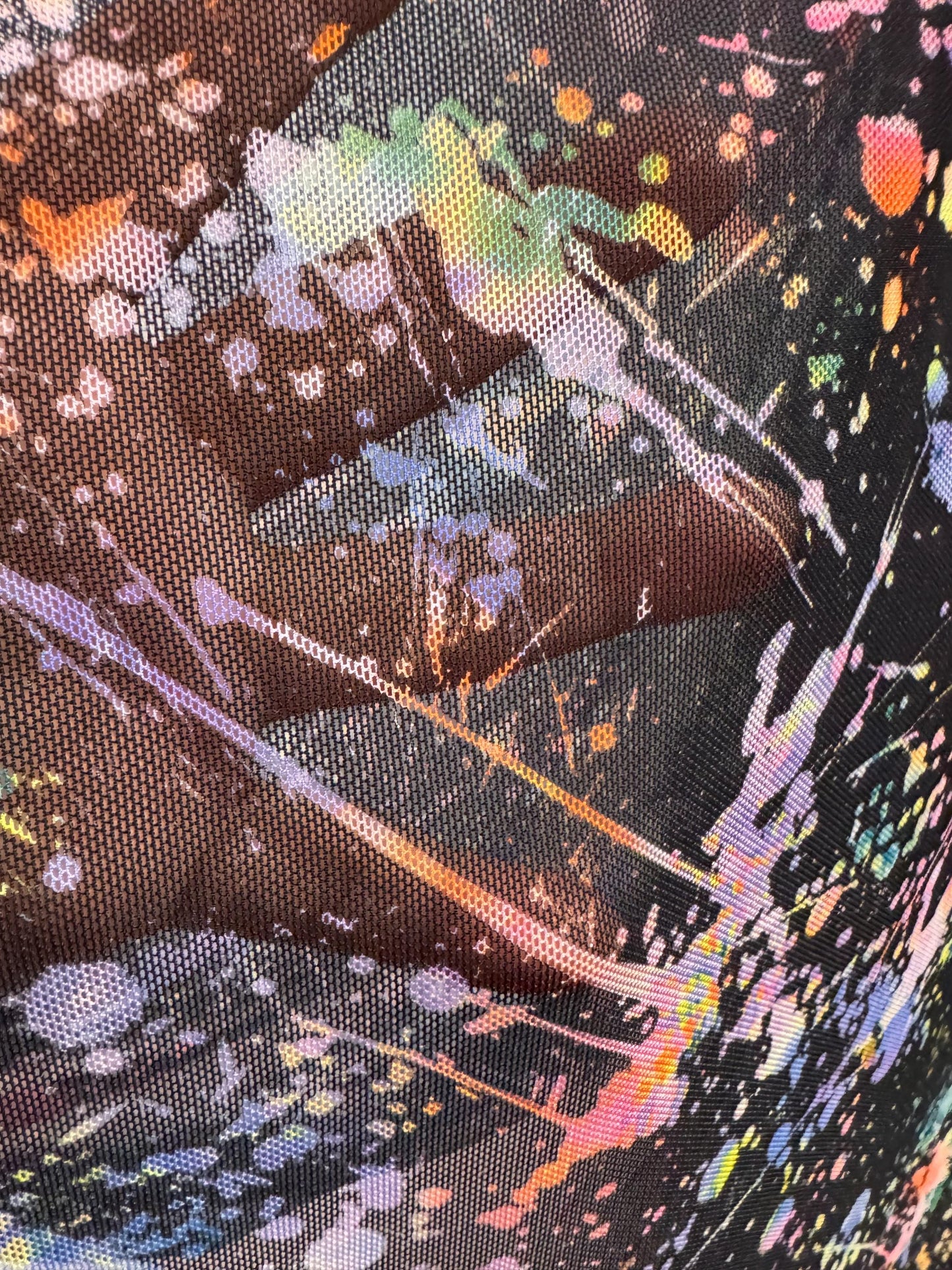 New colorful paint splatter design print on power mesh 4-way stretch 58/60” sold by the YD.ships worldwide from Los Ángeles California USA