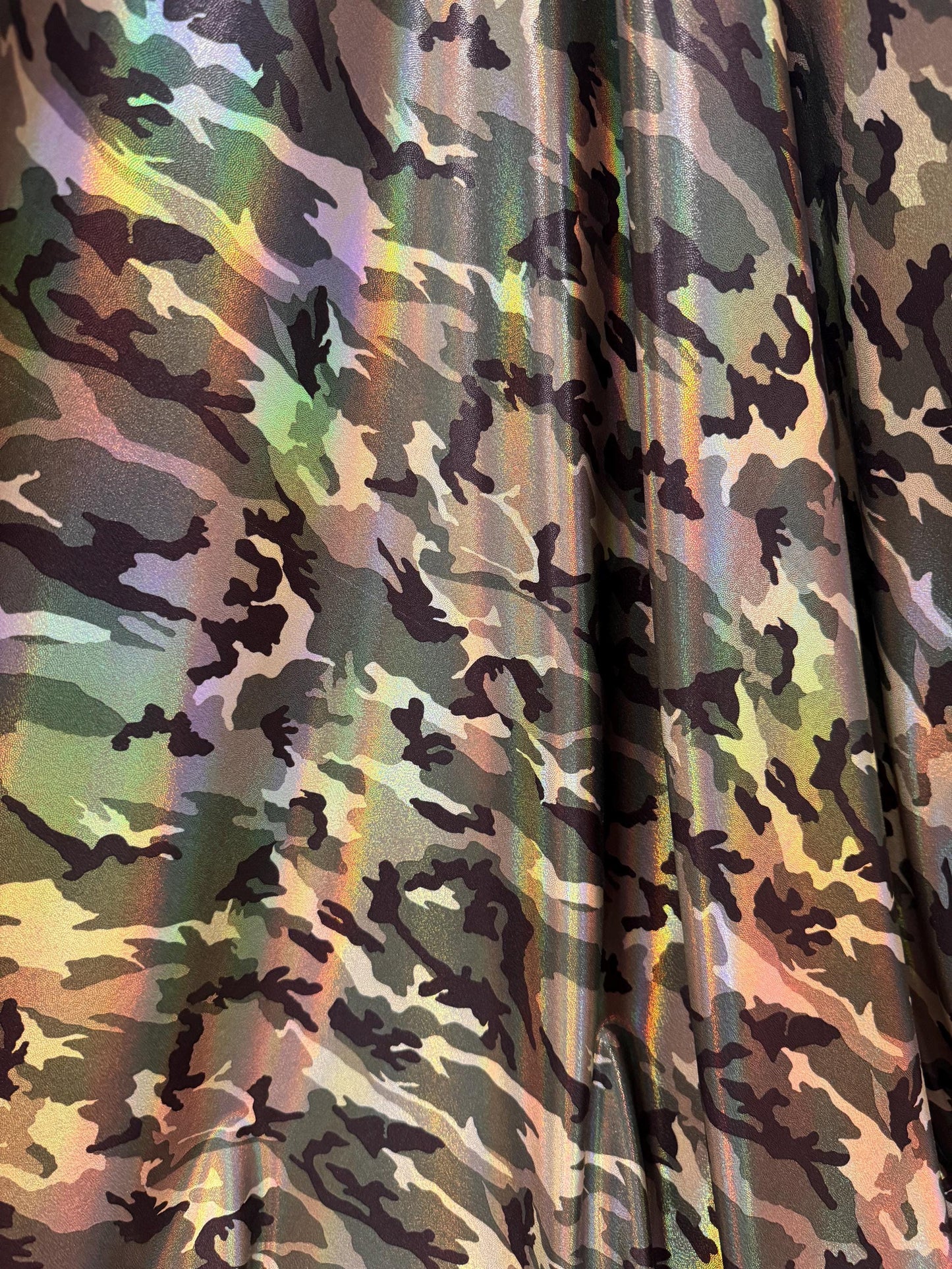 New Iridescent Army Camouflage design print on metallic nylon spandex 4-way stretch 58/60”Sold by the YD.Ships worldwide from Los Angeles CA