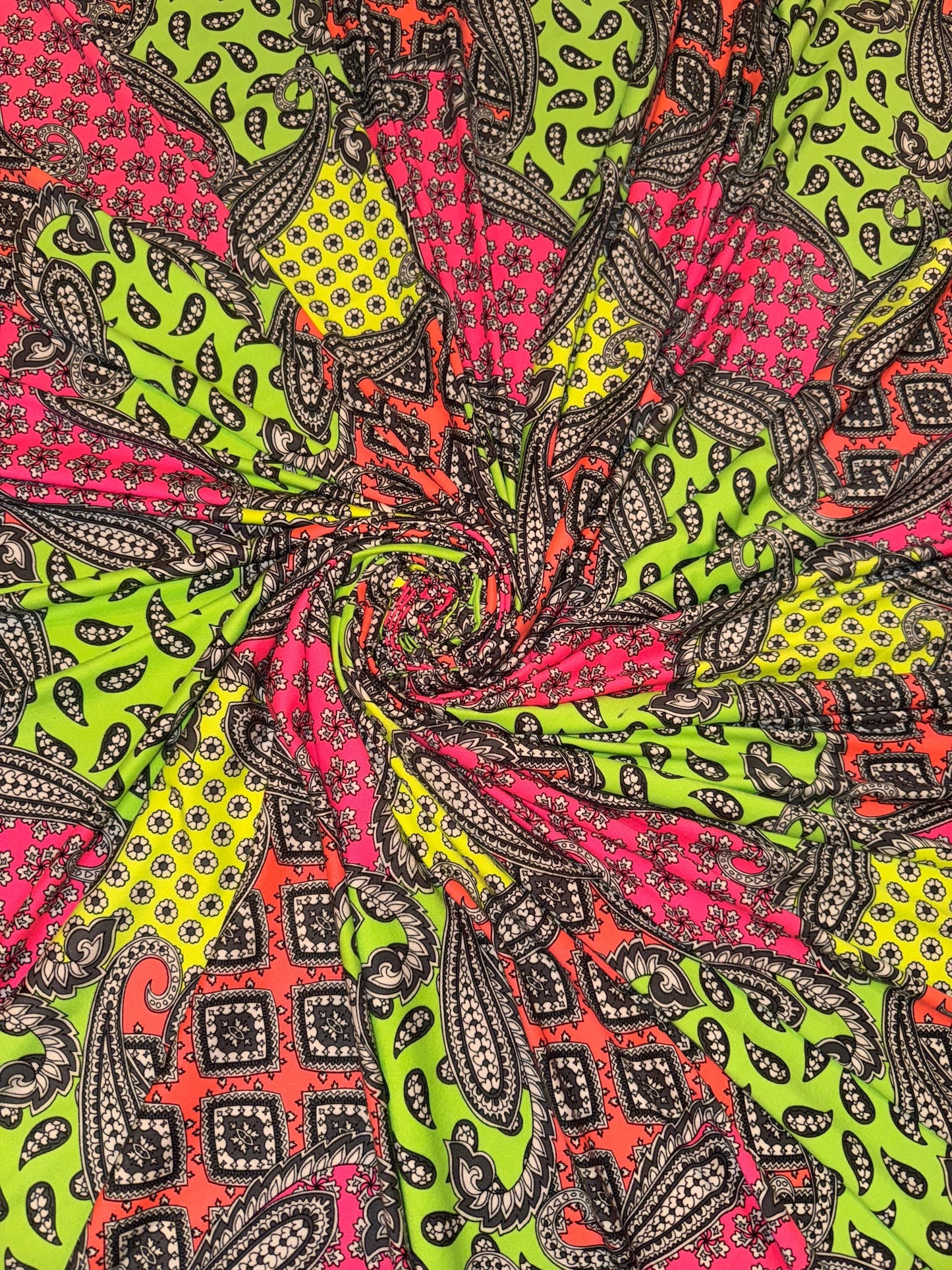 New Bandana neon color UV light  design print on the best quality of poly  spandex 4-way stretch 58/60”sold by the YD. Ships worldwide LA