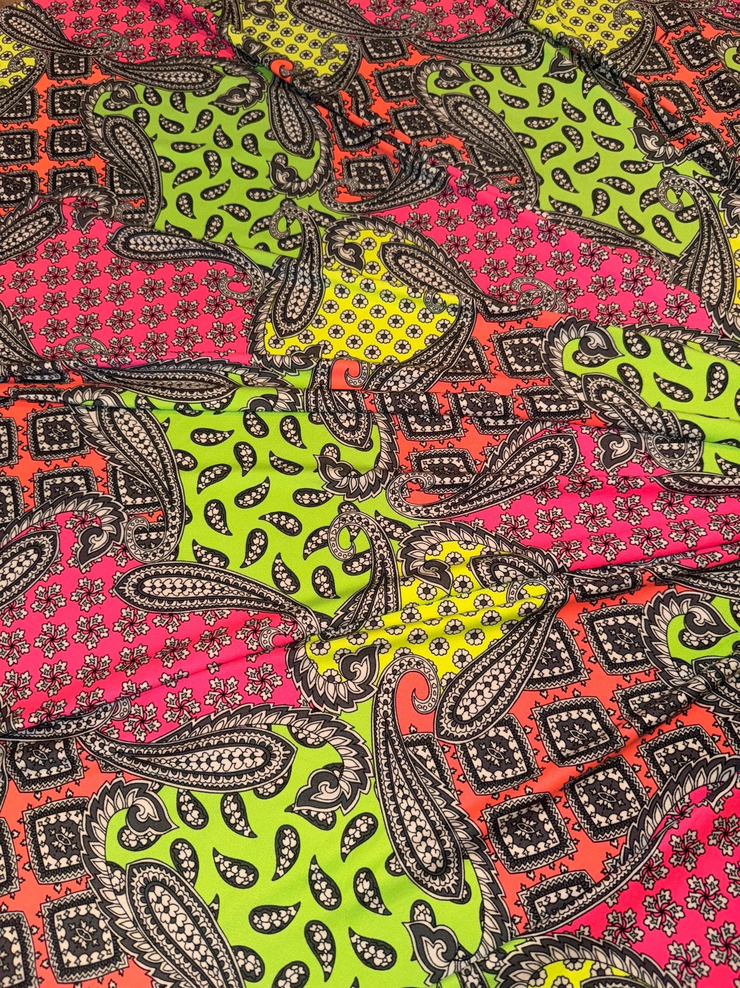 New Bandana neon color UV light  design print on the best quality of poly  spandex 4-way stretch 58/60”sold by the YD. Ships worldwide LA