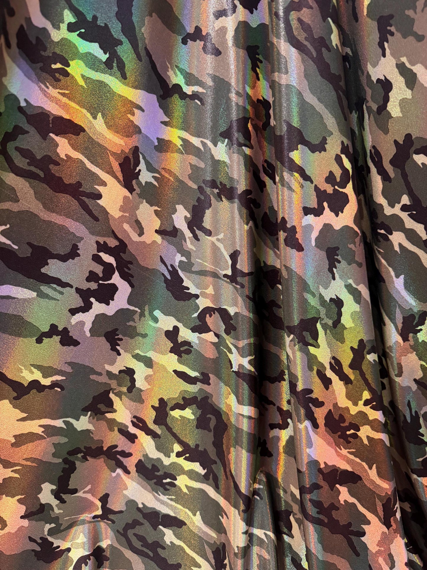 New Iridescent Army Camouflage design print on metallic nylon spandex 4-way stretch 58/60”Sold by the YD.Ships worldwide from Los Angeles CA