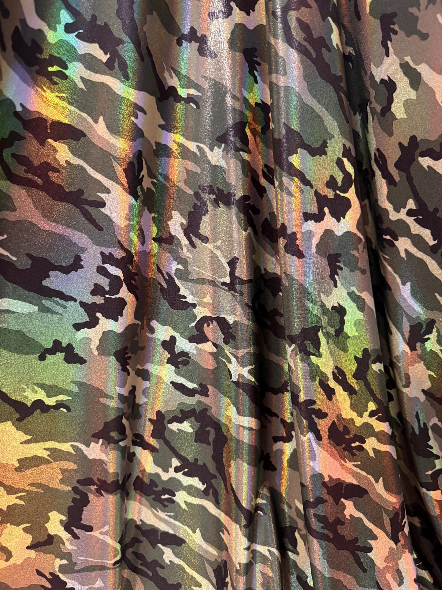 New Iridescent Army Camouflage design print on metallic nylon spandex 4-way stretch 58/60”Sold by the YD.Ships worldwide from Los Angeles CA