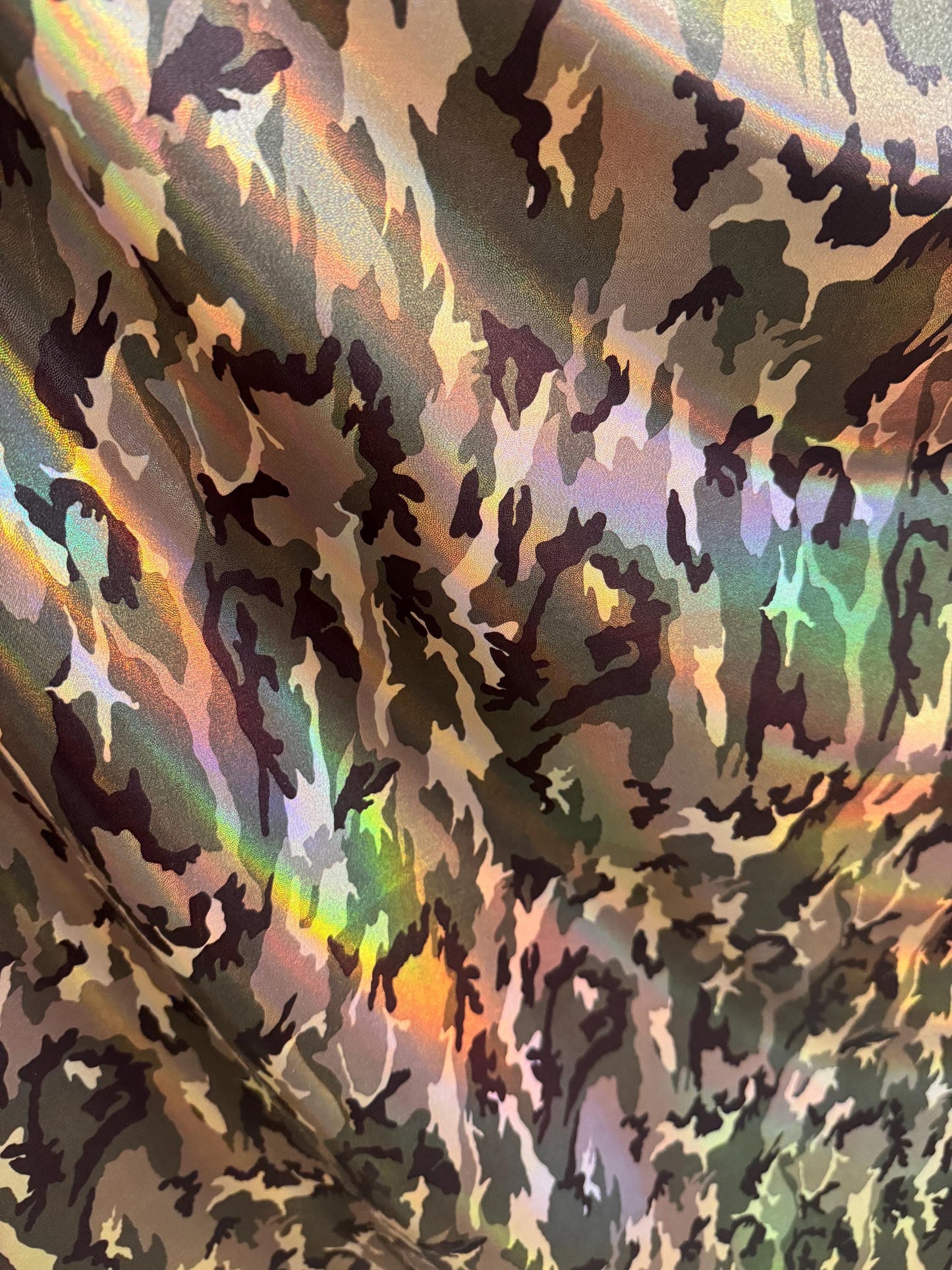 New Iridescent Army Camouflage design print on metallic nylon spandex 4-way stretch 58/60”Sold by the YD.Ships worldwide from Los Angeles CA