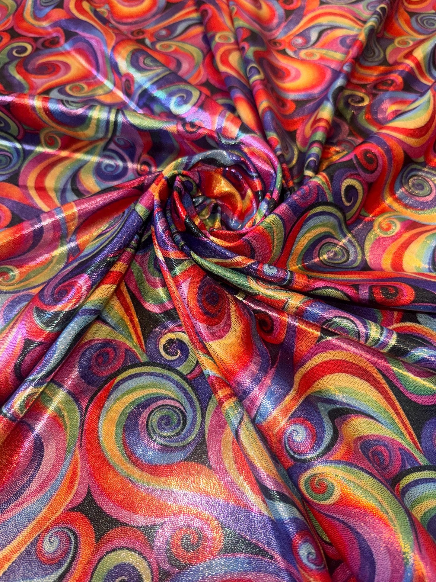 New Multicolor Swirl design print on metallic nylon spandex with foil 4-way stretch 58/60”Sold by the YD.Ships worldwide from LA.