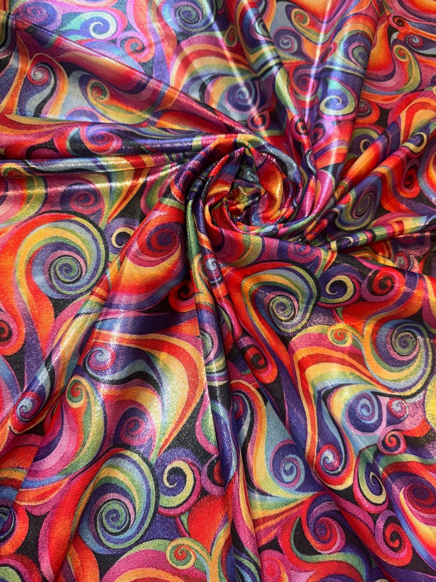 New Multicolor Swirl design print on metallic nylon spandex with foil 4-way stretch 58/60”Sold by the YD.Ships worldwide from LA.