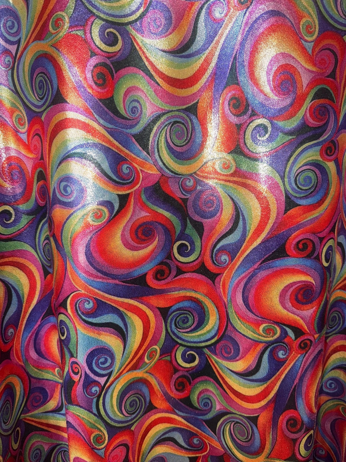 New Multicolor Swirl design print on metallic nylon spandex with foil 4-way stretch 58/60”Sold by the YD.Ships worldwide from LA.