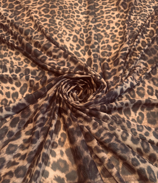 New cheetah animal design print on power mesh 4-way stretch 58/60”sold by the YD. Ships worldwide from Los Angeles California USA.