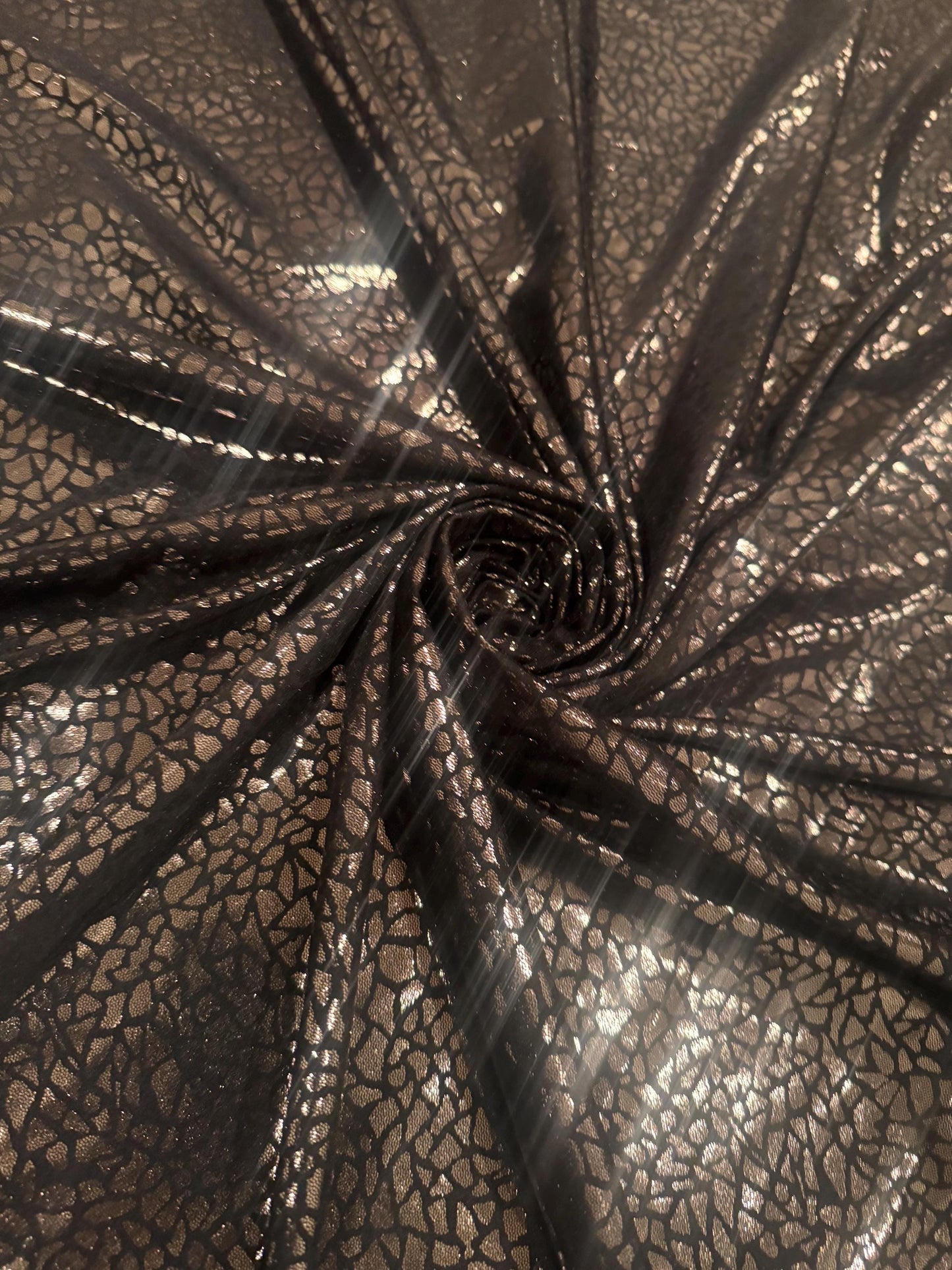 New metallic pebbles rocks print on nylon spandex 4-way stretch 58/60 by the YD. ships worldwide from Los Angeles California USA.