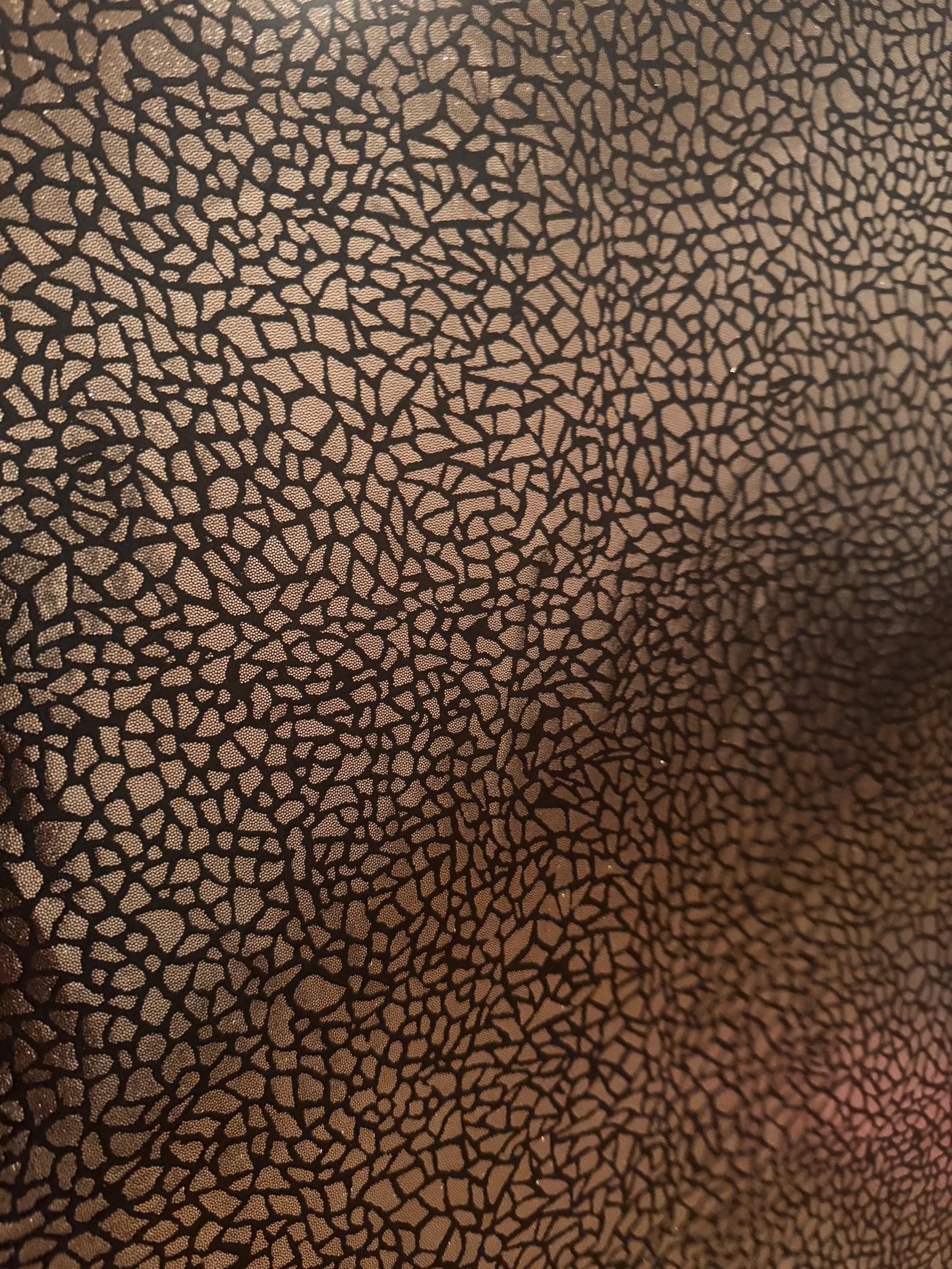 New metallic pebbles rocks print on nylon spandex 4-way stretch 58/60 by the YD. ships worldwide from Los Angeles California USA.