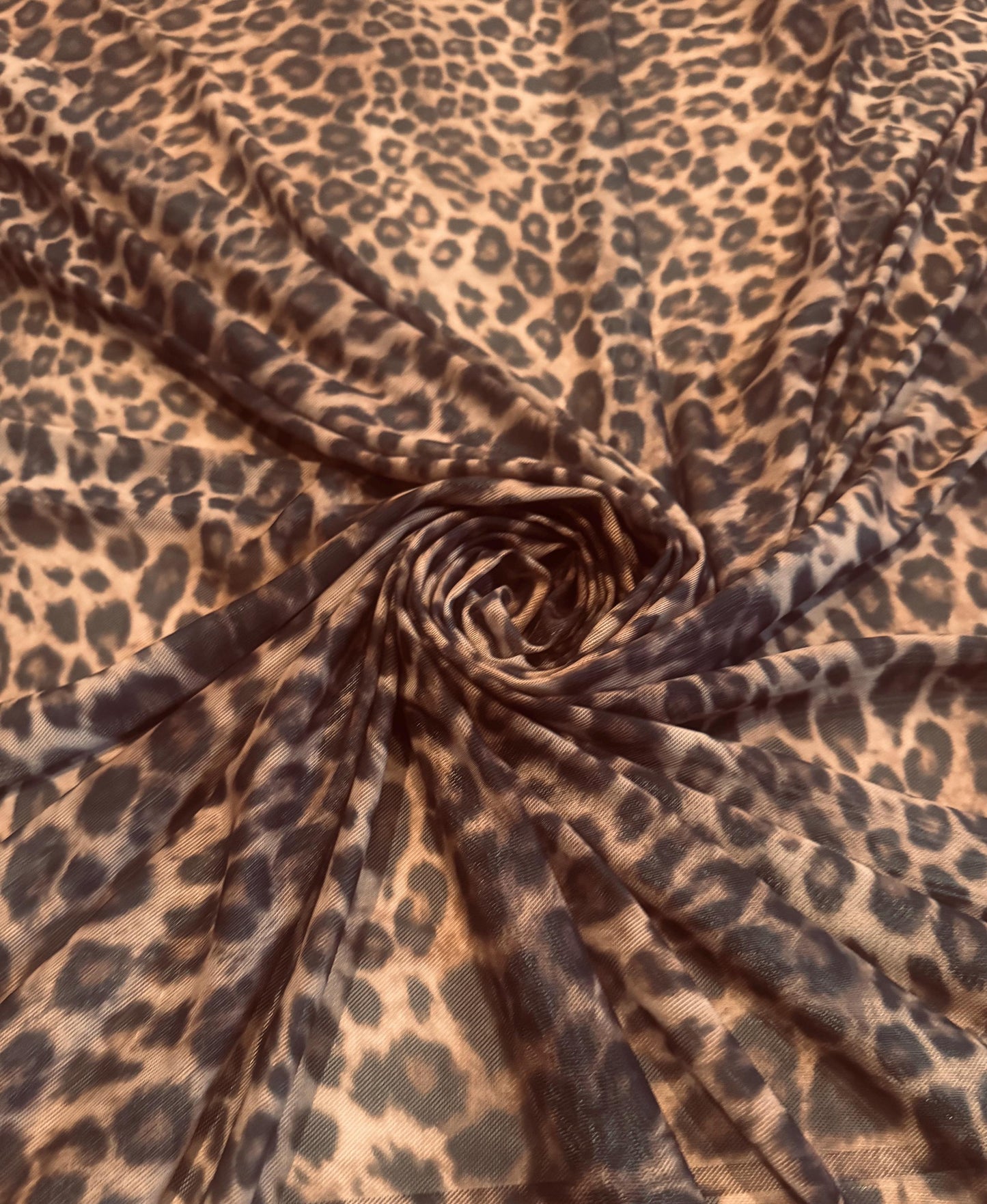 New cheetah animal design print on power mesh 4-way stretch 58/60”sold by the YD. Ships worldwide from Los Angeles California USA.