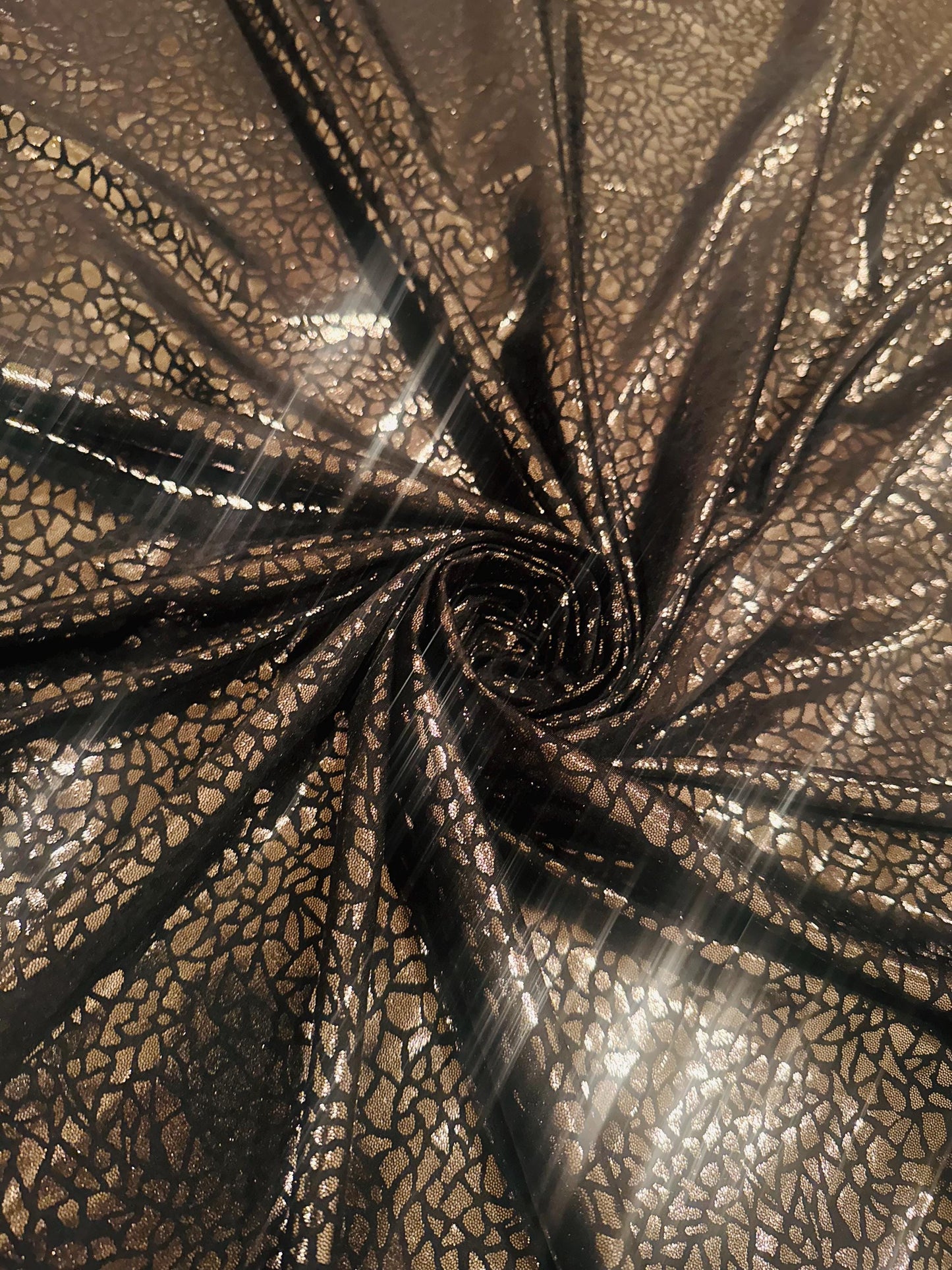 New metallic pebbles rocks print on nylon spandex 4-way stretch 58/60 by the YD. ships worldwide from Los Angeles California USA.