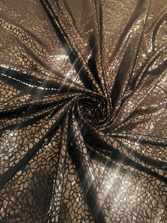 New metallic pebbles rocks print on nylon spandex 4-way stretch 58/60 by the YD. ships worldwide from Los Angeles California USA.