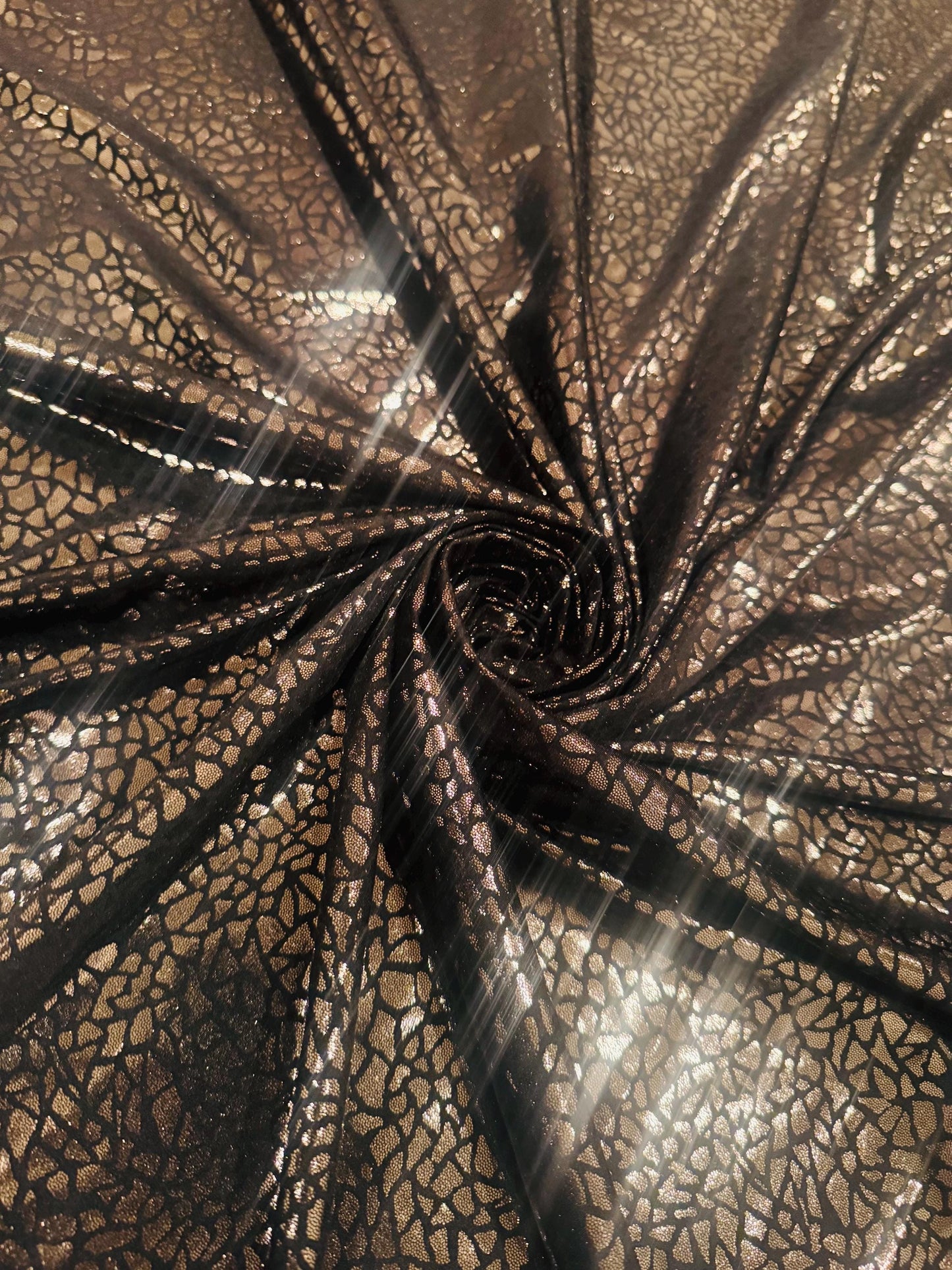 New metallic pebbles rocks print on nylon spandex 4-way stretch 58/60 by the YD. ships worldwide from Los Angeles California USA.