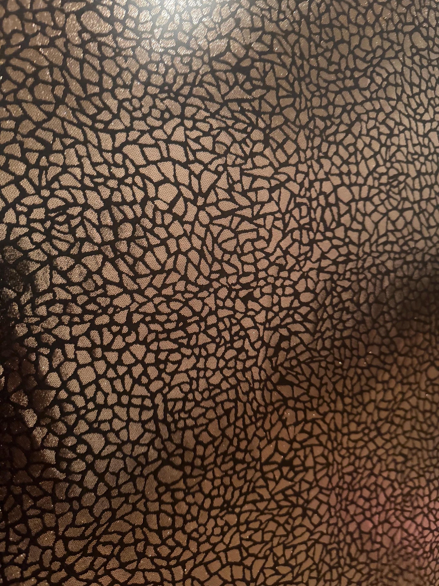 New metallic pebbles rocks print on nylon spandex 4-way stretch 58/60 by the YD. ships worldwide from Los Angeles California USA.