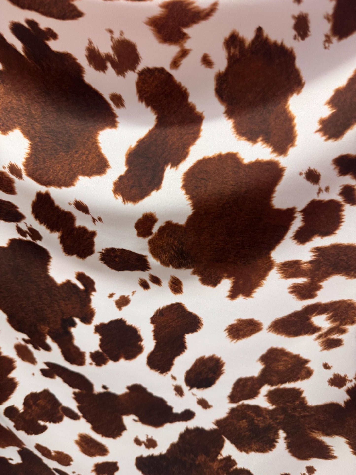 New Brown/White cow design print on best quality of nylon spandex 4-way stretch 58/60”sold by the YD. ships Worldwide from Los Angeles CA