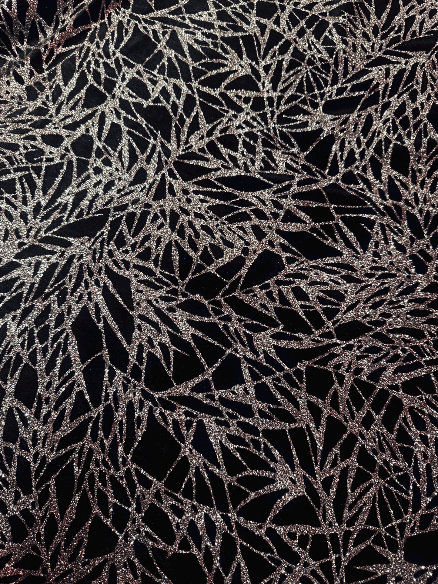 New shattered glass design with glitter on heavy stretch velvet 4-way stretch 58/60”sold by the YD. Ships worldwide from Los Angeles CA