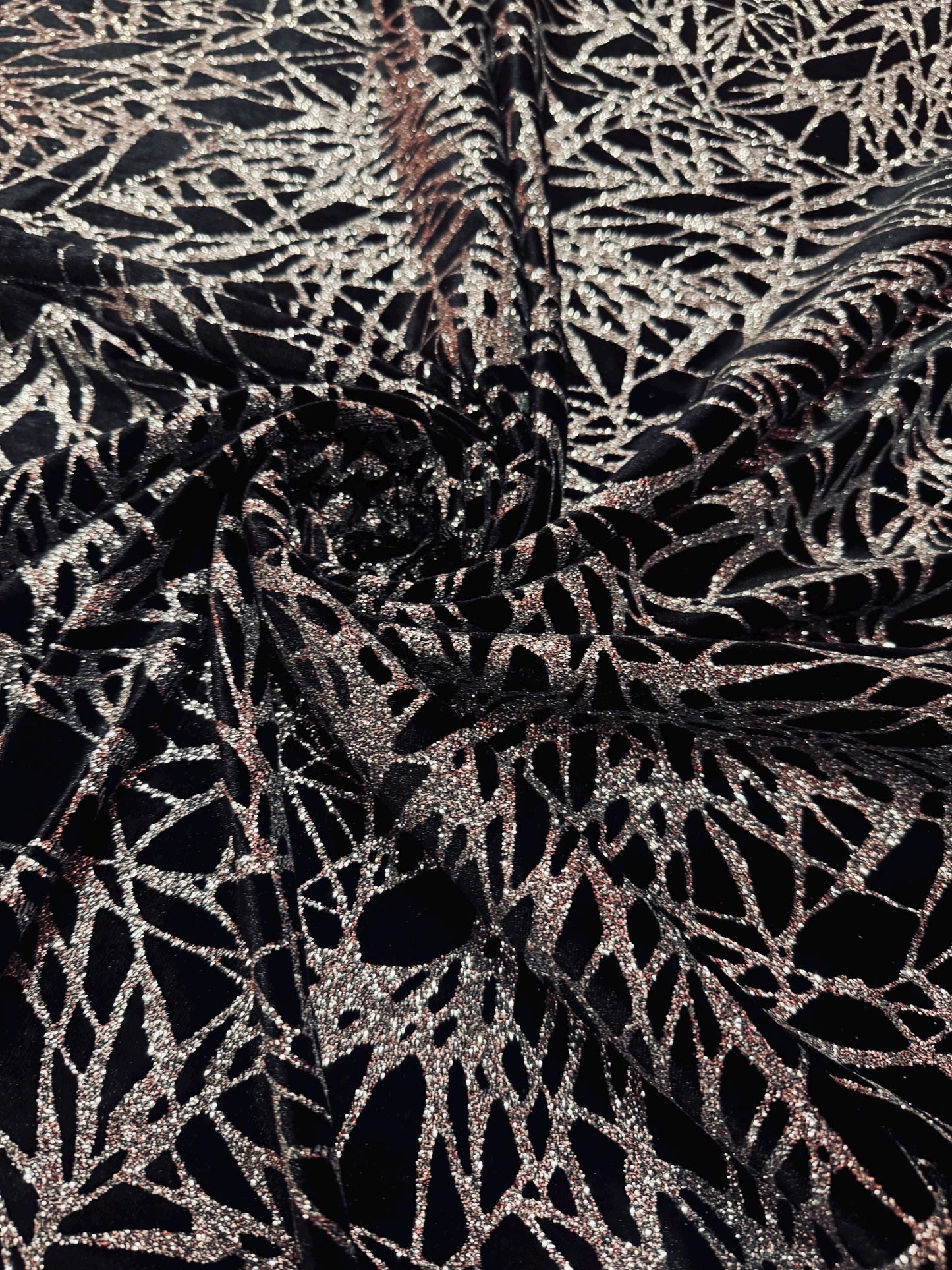 New shattered glass design with glitter on heavy stretch velvet 4-way stretch 58/60”sold by the YD. Ships worldwide from Los Angeles CA