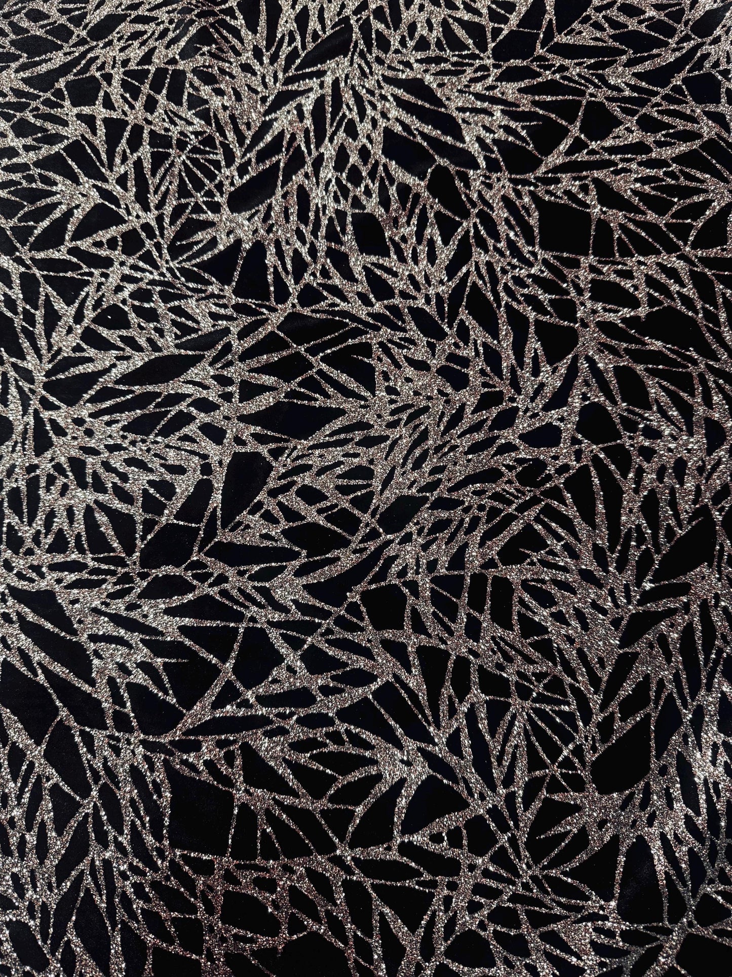 New shattered glass design with glitter on heavy stretch velvet 4-way stretch 58/60”sold by the YD. Ships worldwide from Los Angeles CA