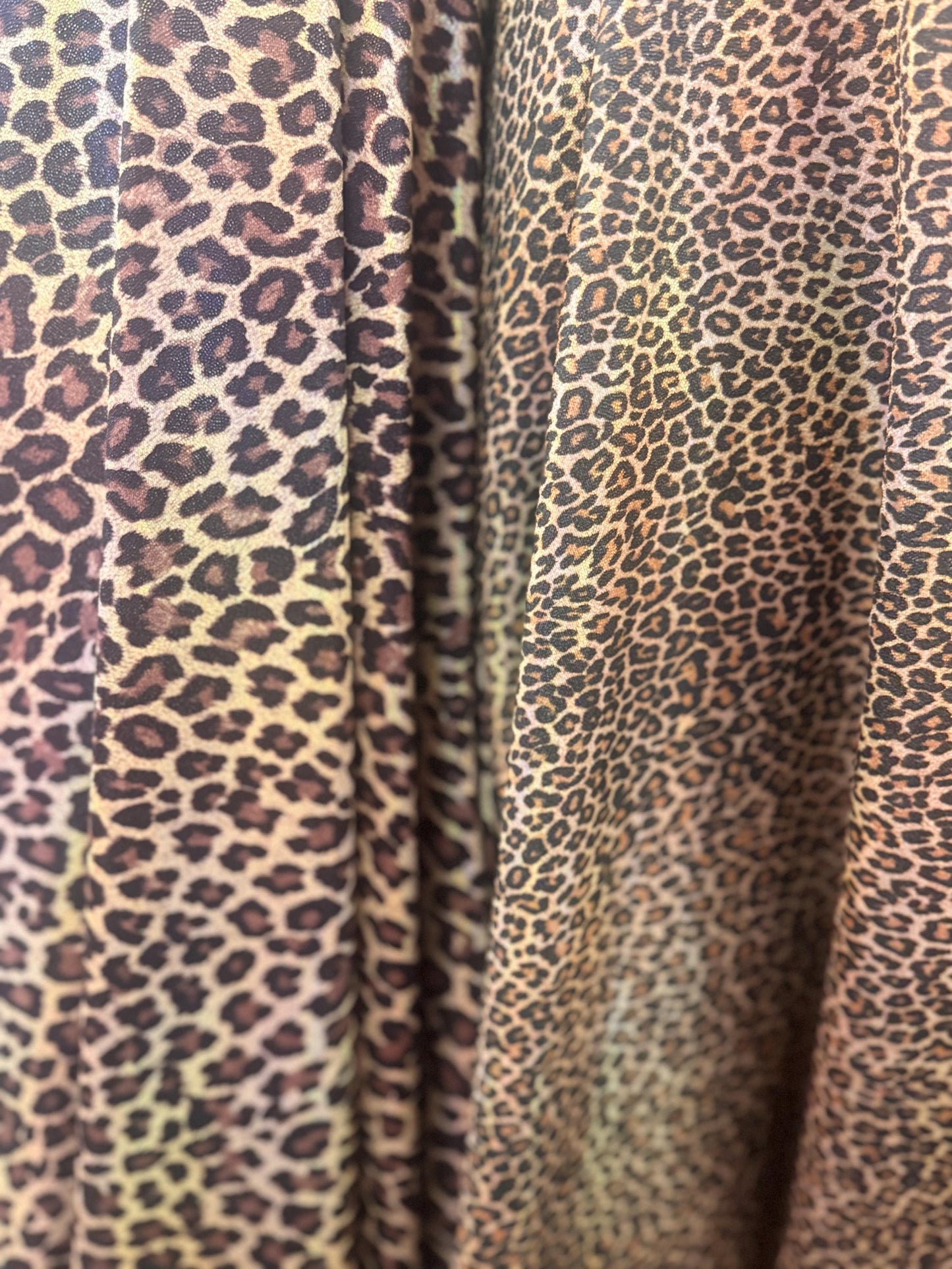 New Leopard skin design hologram metallic nylon spandex 4-way stretch 58/60”Sold by the YD.Ships worldwide from Los Angeles California USA.