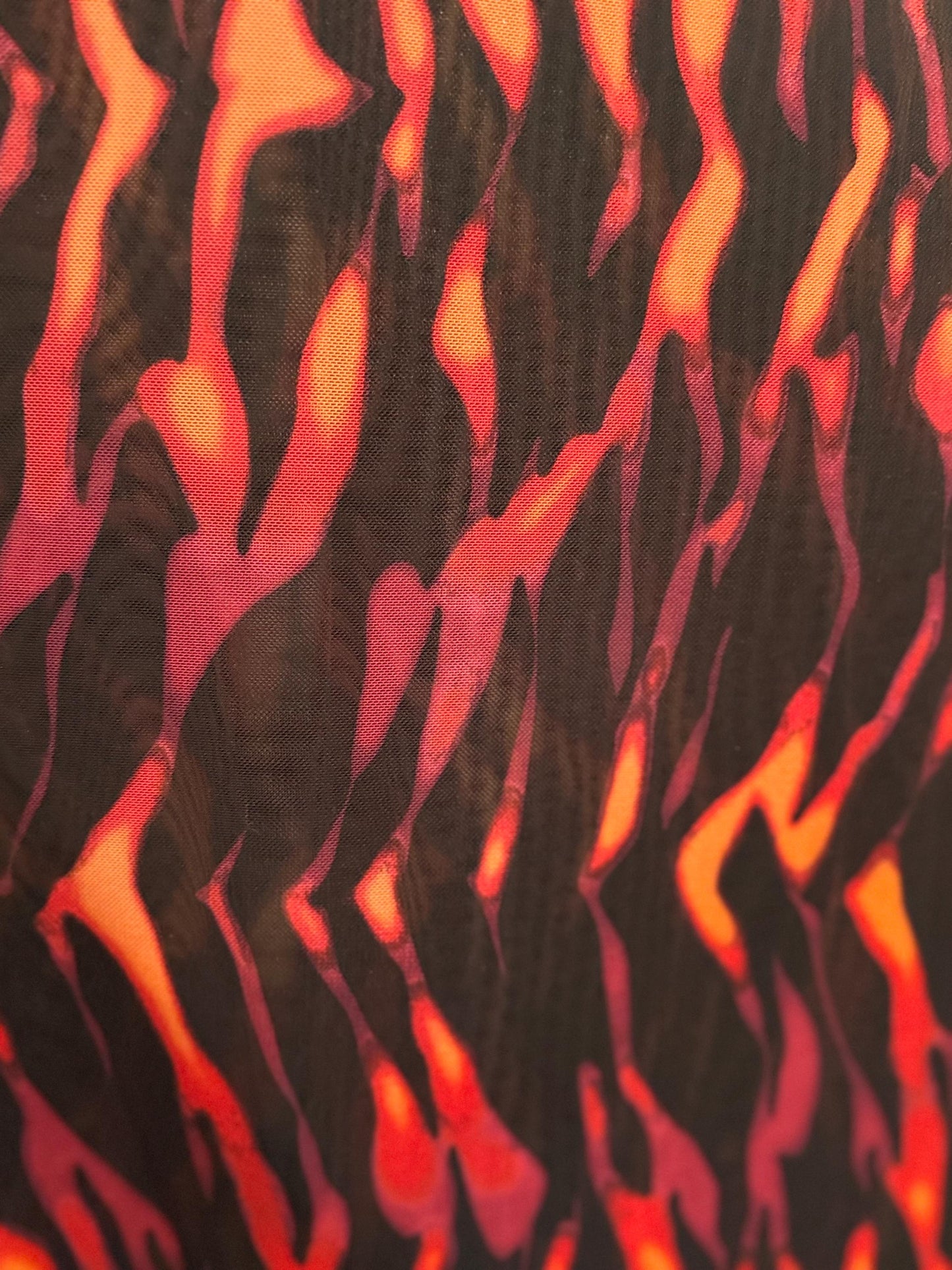 New hot fire flames  design print on nylon spandex and power mesh 4-way stretch 58/60”Sold by the YD.Ships worldwide from Los Angeles CA.