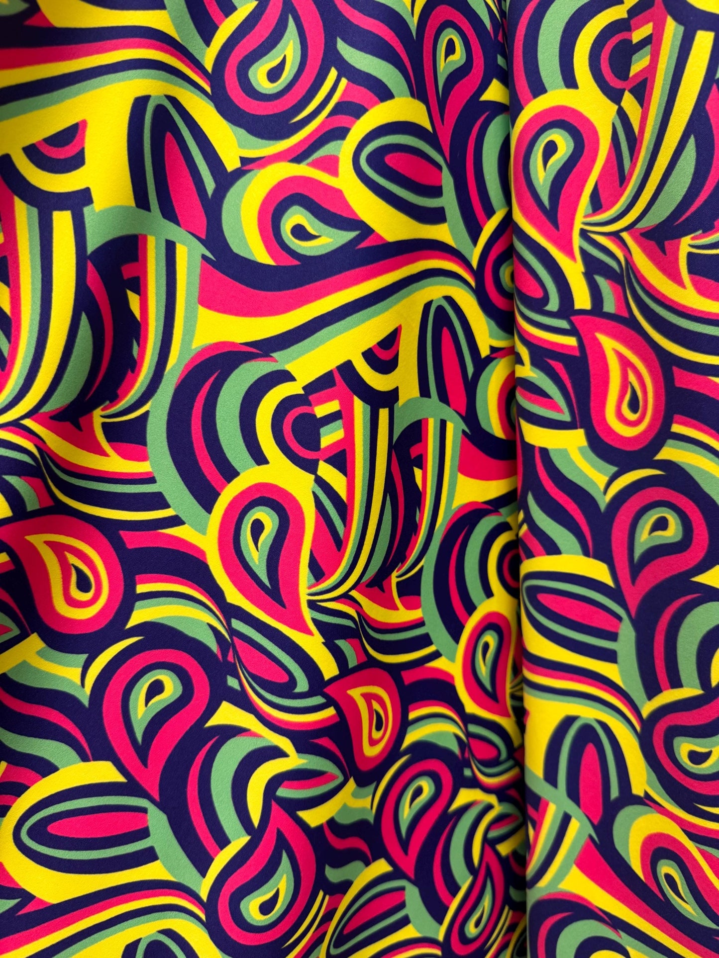 New colorful paisley design print on the best quality of nylon spandex 4-way stretch 58/60”Sold by the YD.Ships worldwide from Los Angeles