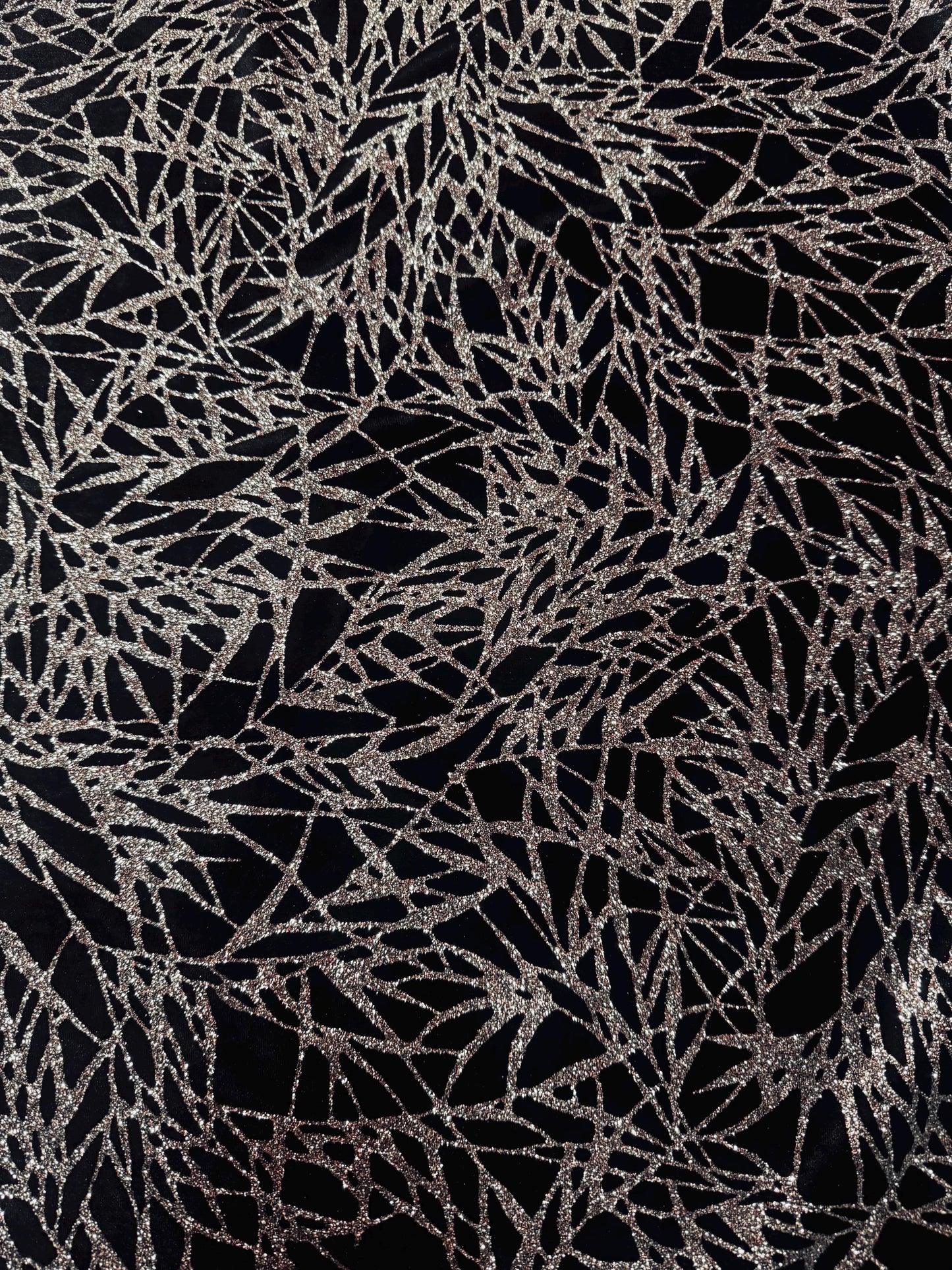 New shattered glass design with glitter on heavy stretch velvet 4-way stretch 58/60”sold by the YD. Ships worldwide from Los Angeles CA