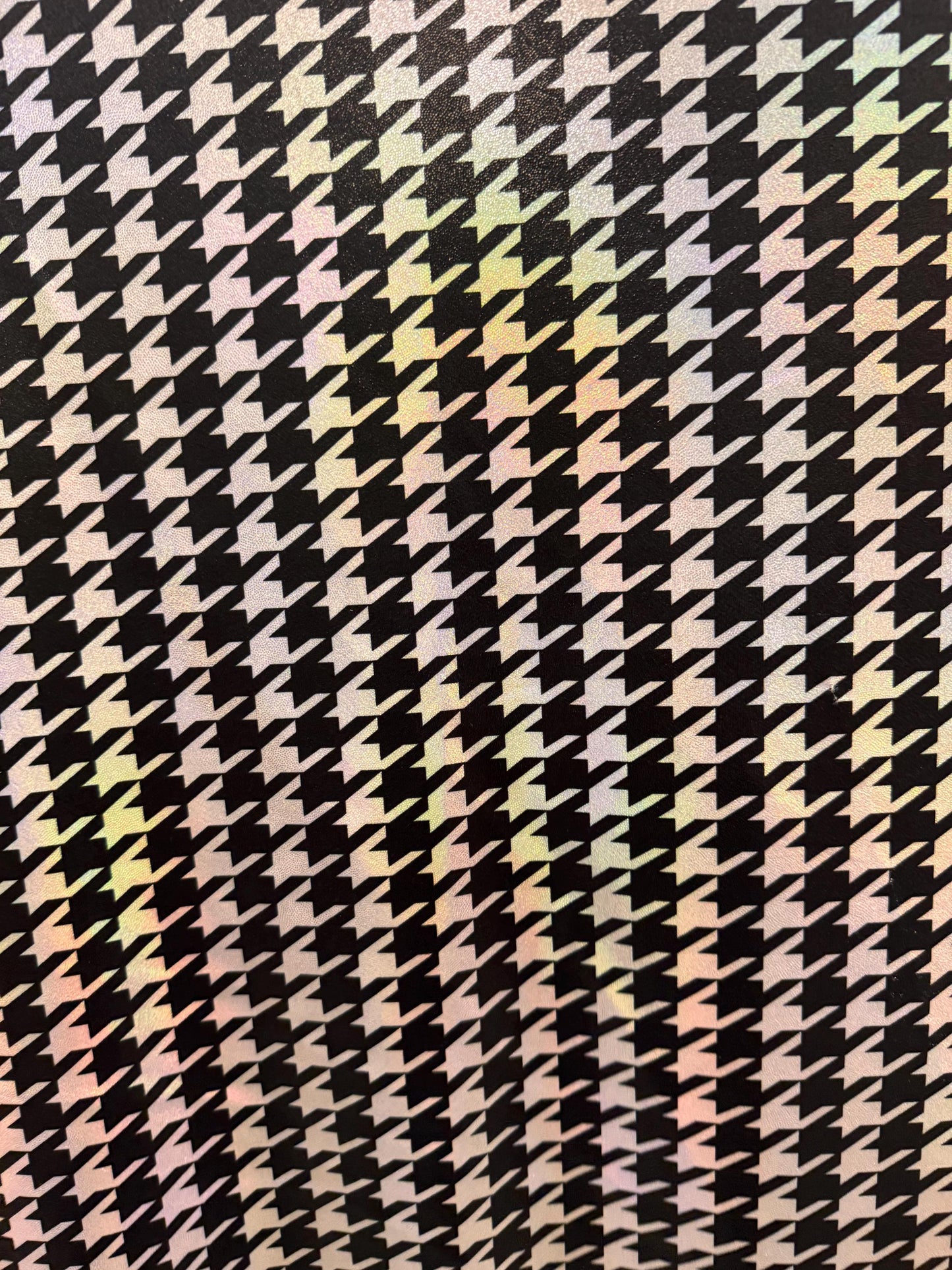 Houndstooth Luxury pattern design with iridescent foil metallic nylon spandex 4-way stretch 58/60”Sold by the YD.Ships worldwide from LA