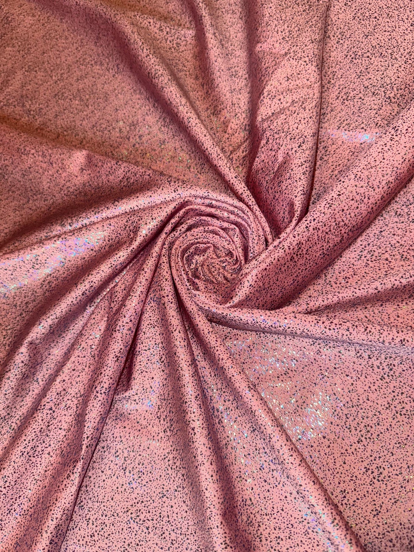 New Hologram Metallic pebbles design print on nylon spandex 4-way stretch 58/60”Sold by the YD.Ships worldwide from Los Angeles California