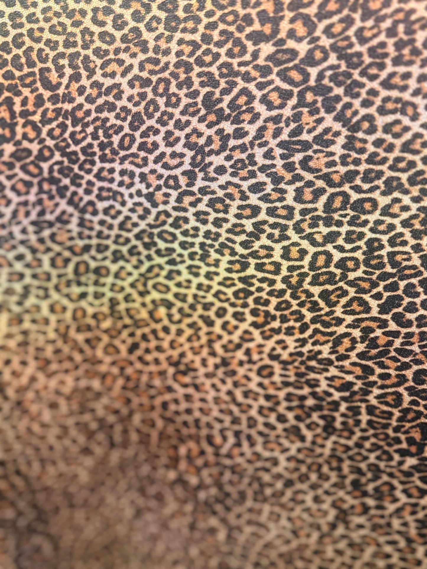 New Leopard skin design hologram metallic nylon spandex 4-way stretch 58/60”Sold by the YD.Ships worldwide from Los Angeles California USA.