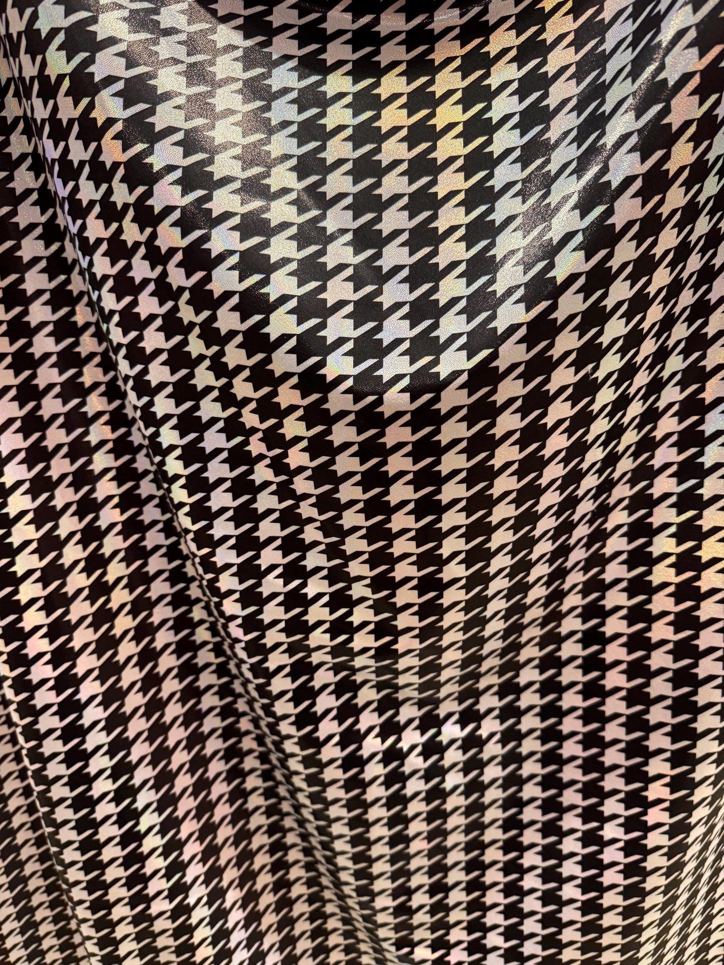 Houndstooth Luxury pattern design with iridescent foil metallic nylon spandex 4-way stretch 58/60”Sold by the YD.Ships worldwide from LA