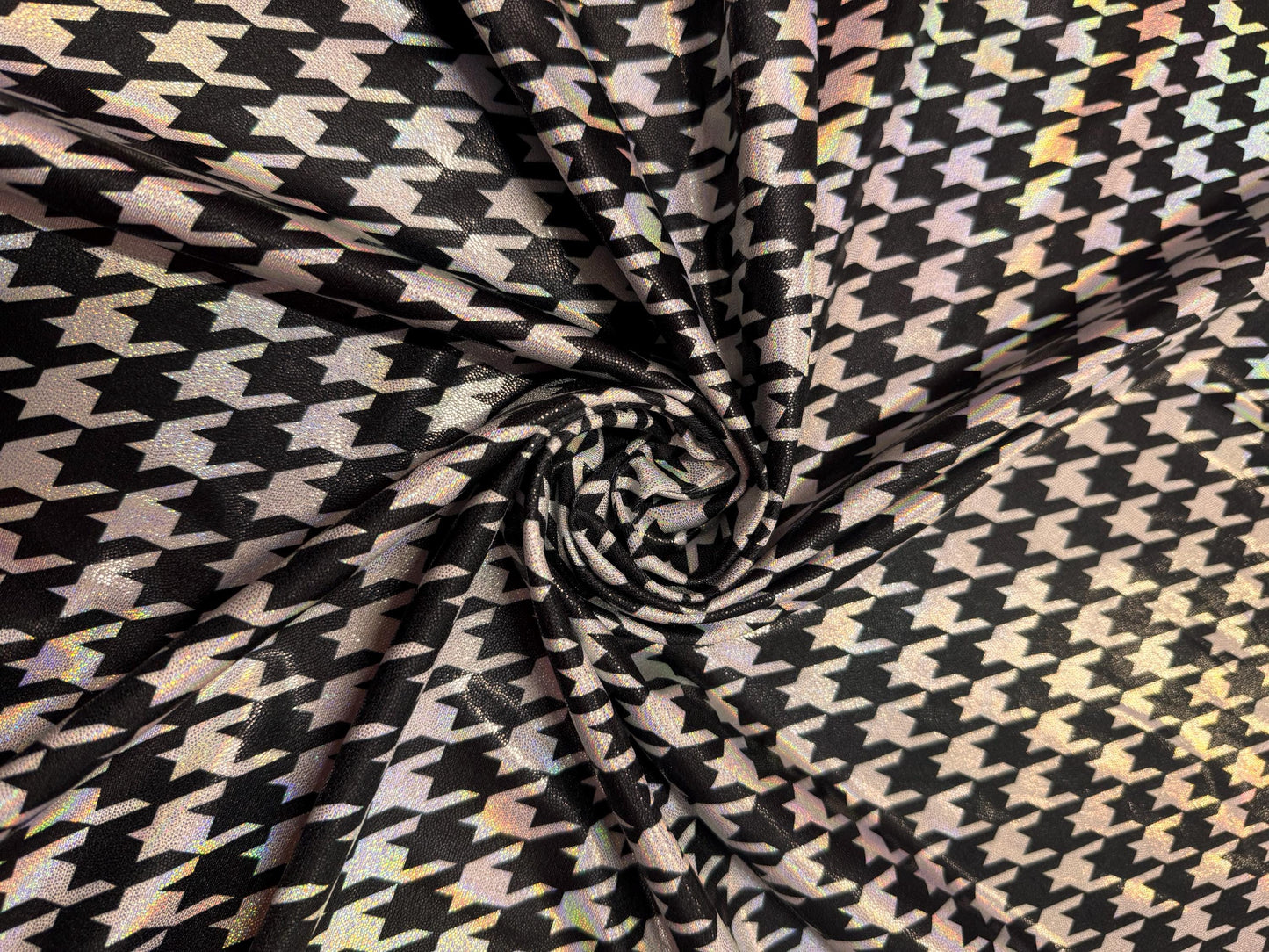 Houndstooth Luxury pattern design with iridescent foil metallic nylon spandex 4-way stretch 58/60”Sold by the YD.Ships worldwide from LA